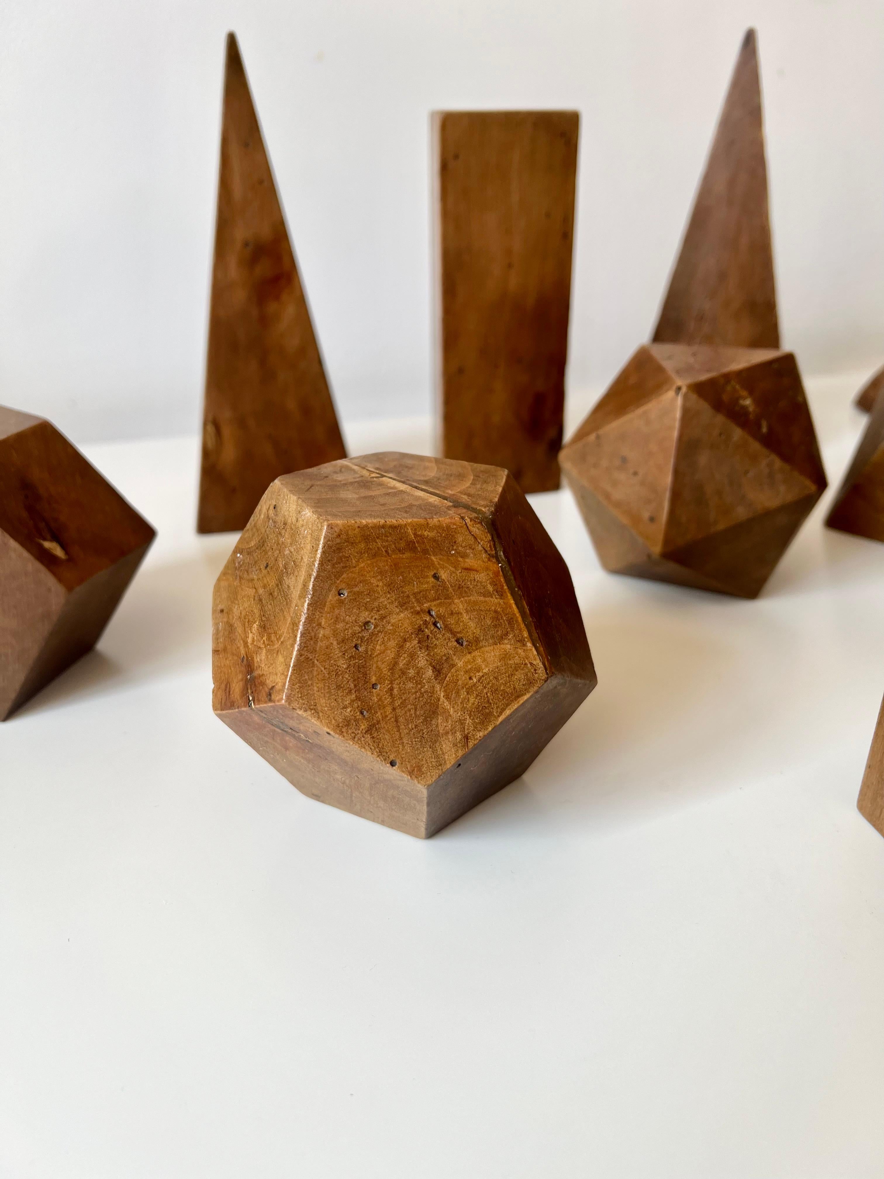 Hardwood Set of 12 vintage antique wooden geometric shapes. Italy, late 19th early 20th C