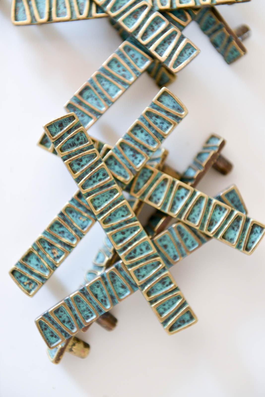 Set of 12 vintage brass and enamel cabinet hardware, circa 1965. Beautiful brass with enameled interior. 

Measures: 4.25
