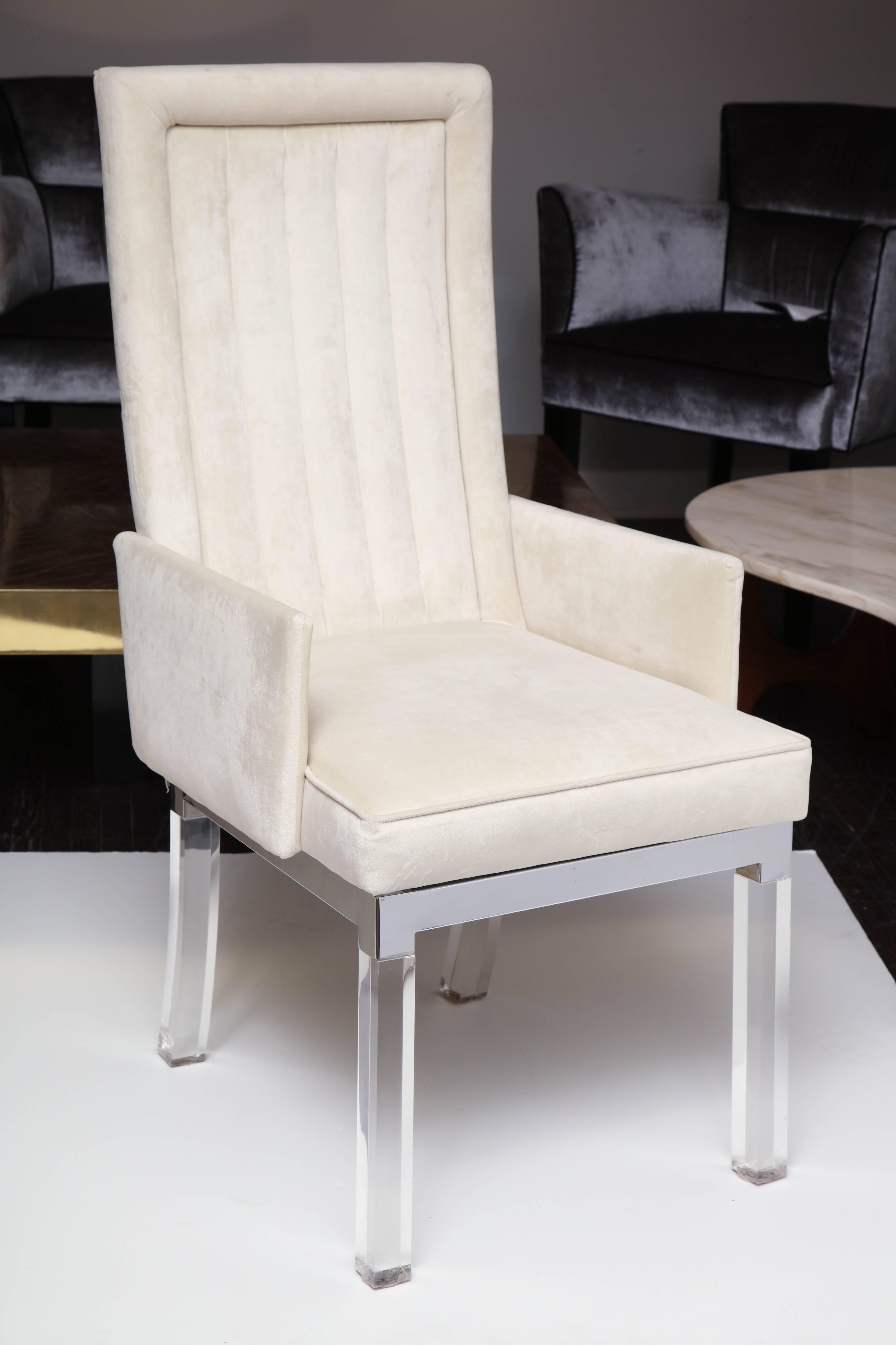 Set of 12 vintage Charles Hollis Jones dining chairs. Ten side and two arms with chrome base and Lucite legs. Upholstered in ivory ultra suede.