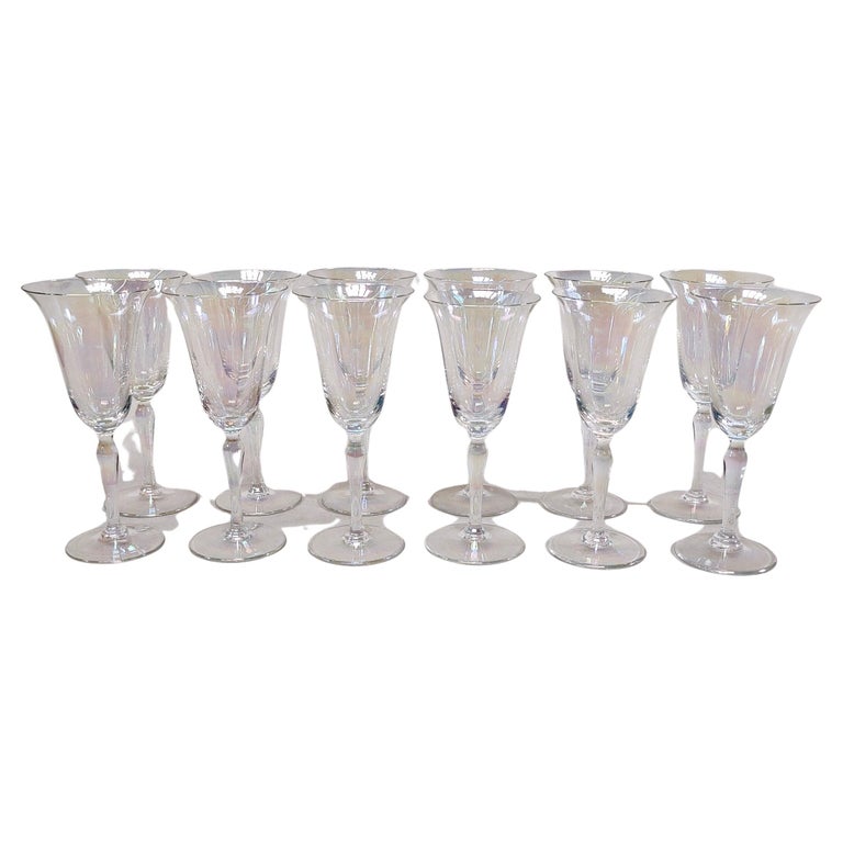 https://a.1stdibscdn.com/set-of-12-vintage-hand-blown-iridescent-luster-tulip-wine-glasses-1930s-for-sale/f_65002/f_351872021689118385993/f_35187202_1689118386705_bg_processed.jpg?width=768
