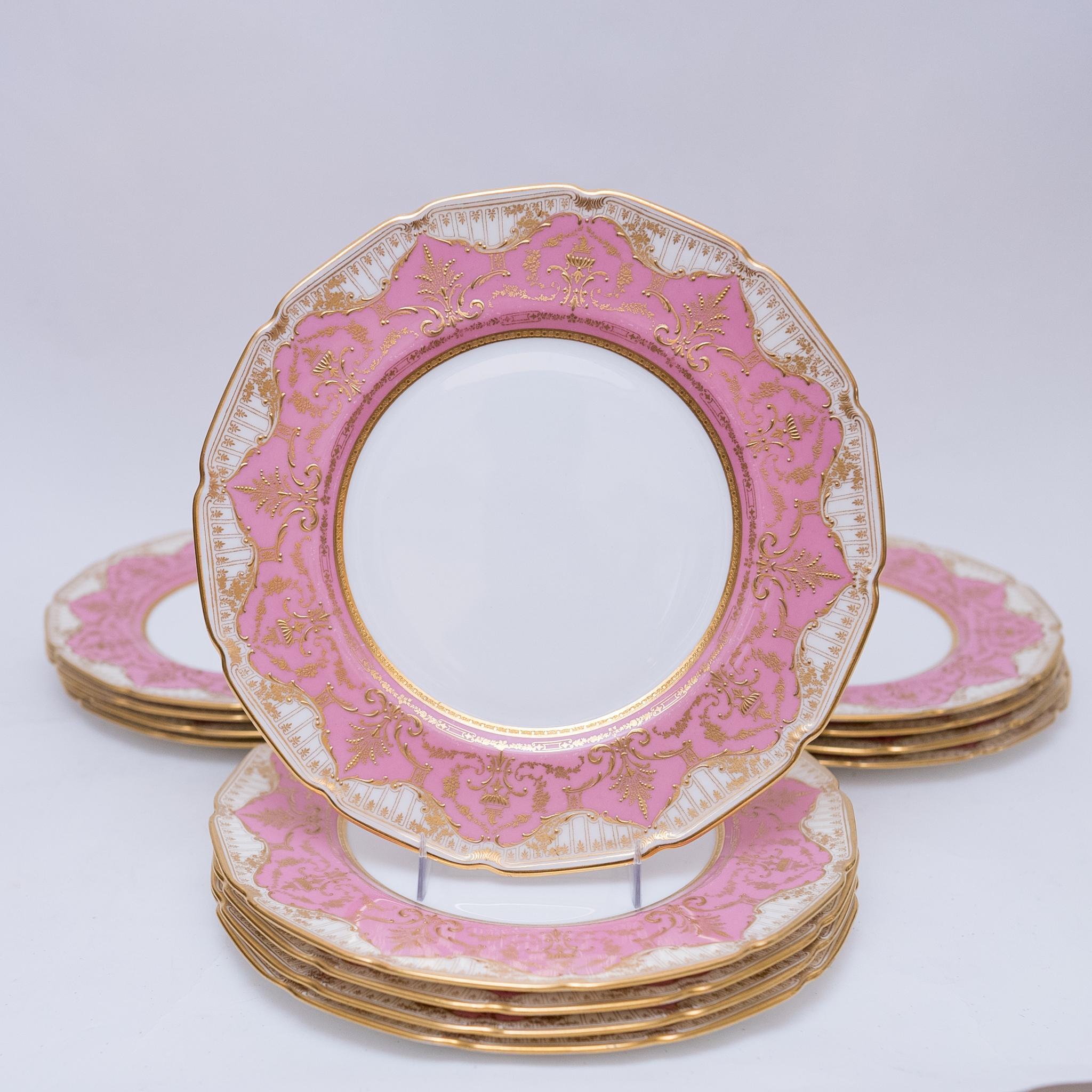 British Set of 13 Antique English Dinner Plates circa 1910, Raised Gilding on Pink