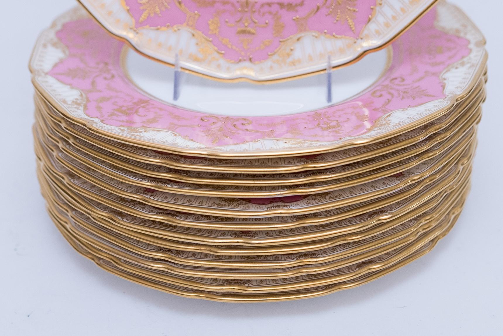 Hand-Crafted Set of 13 Antique English Dinner Plates circa 1910, Raised Gilding on Pink