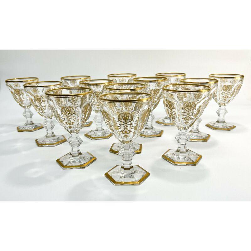 Set of 13 Baccarat France crystal glass wine goblets in Harcourt Empire, Signed

Adorned with exquisite gold embellishments. Hexagonal base. Acid etched Baccarat France mark to underside

Additional Information:
Style: Empire
Material: