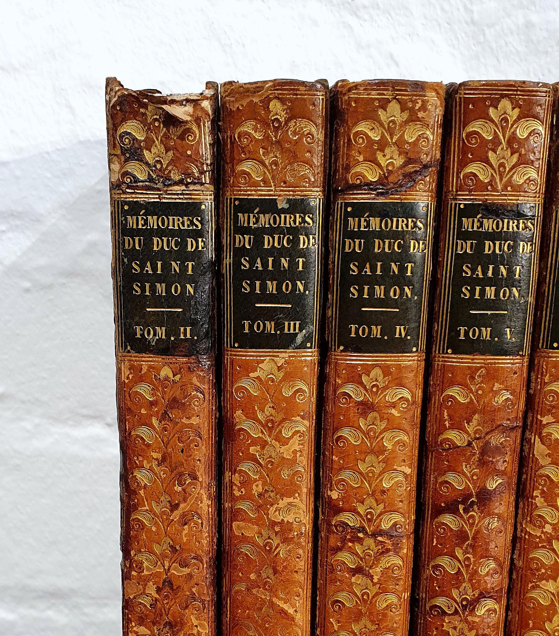 These beautifully leather bound French books are a set of 13, all of which date between 1829-1830. Each book is bound in a rich tone of tan, detailed with gold leaf embossing. The books do have some small amount of damage and water markings, but do