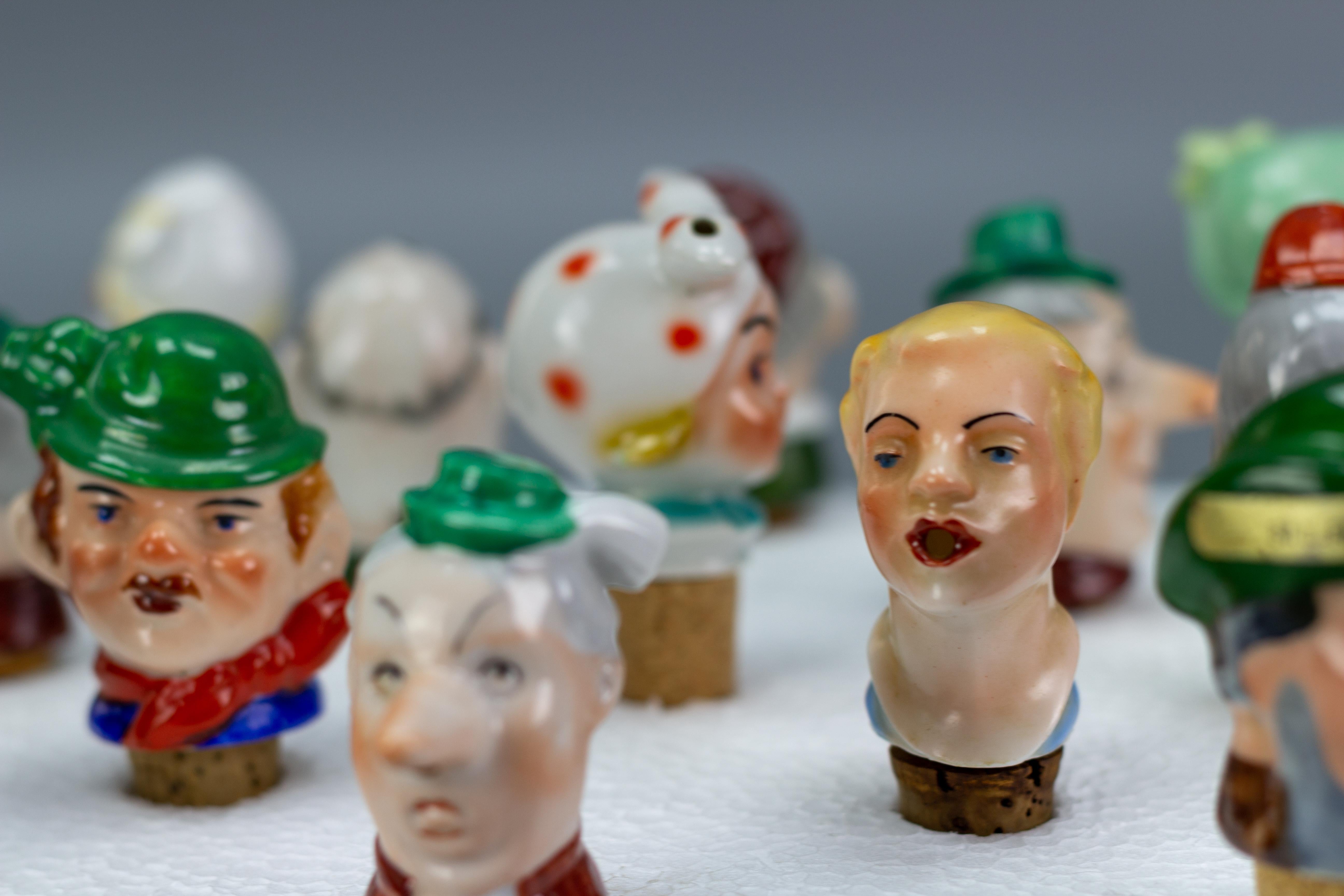 Set of 13 German Figural Porcelain and Cork Pourers Bottle Stoppers, 1930s For Sale 1