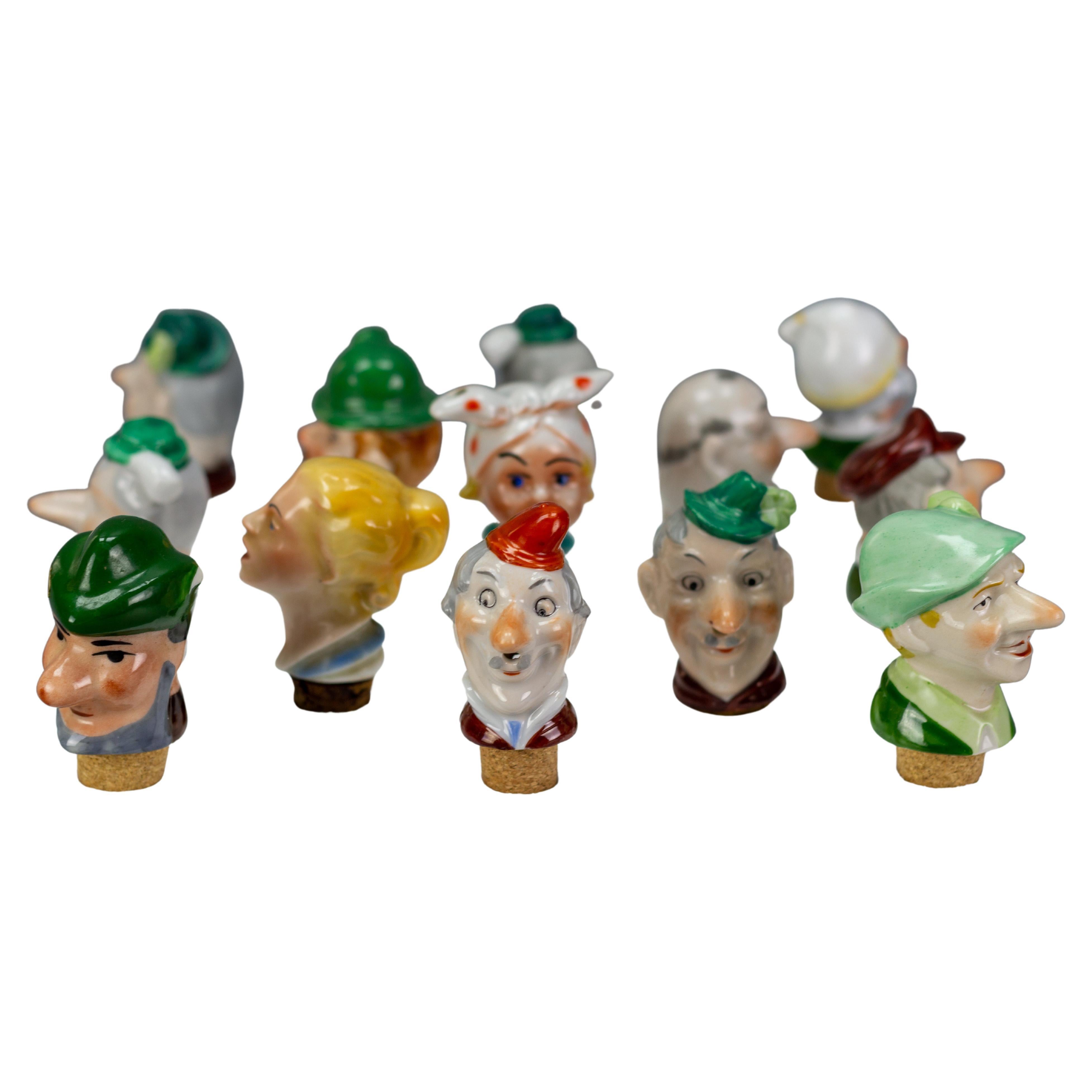 Set of 13 German Figural Porcelain and Cork Pourers Bottle Stoppers, 1930s