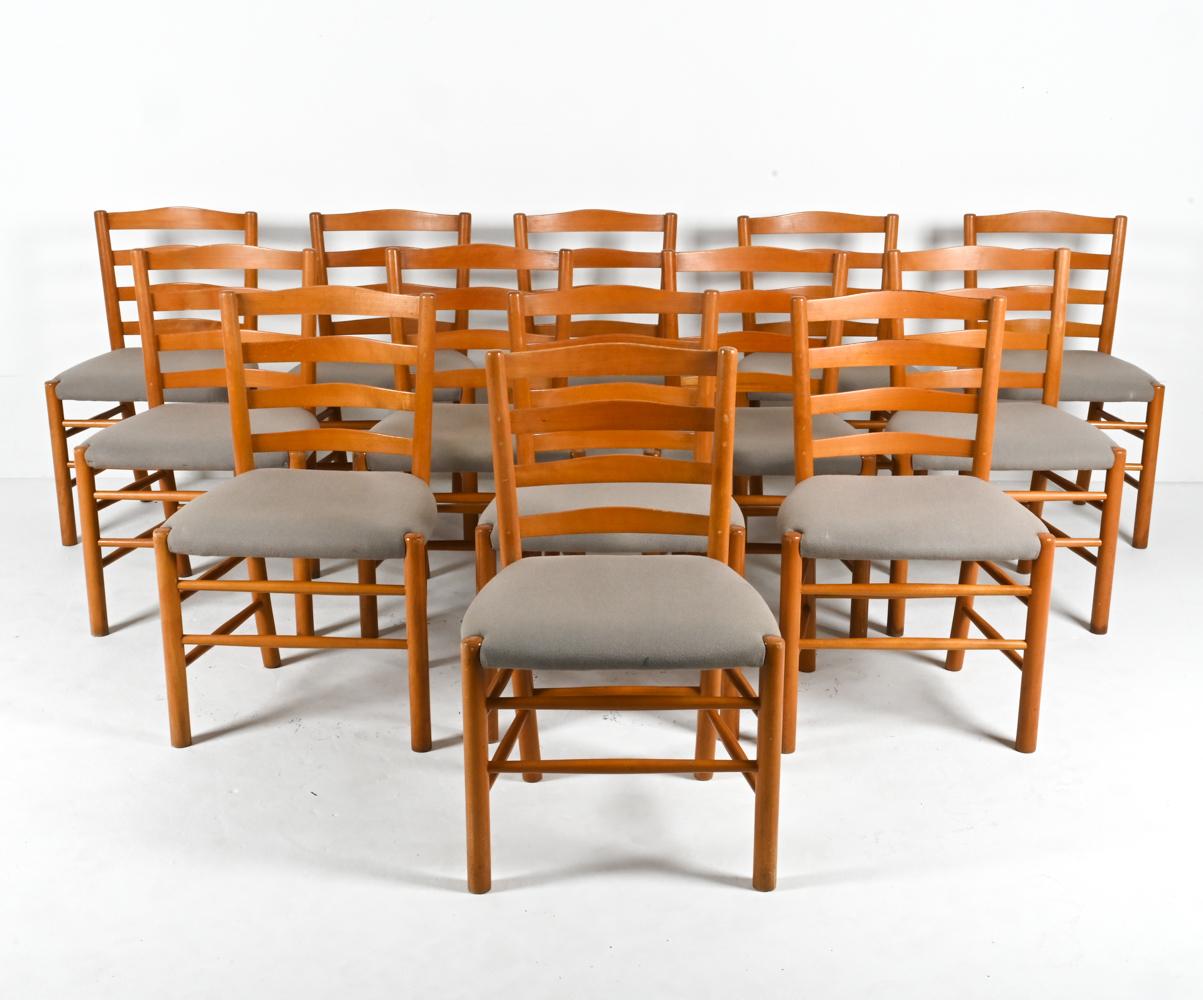 Step into a world where history, craftsmanship, and artistry converge with our exquisite set of 13 Kaare Klint Church Chairs, exclusively curated for Fritz Hansen in the vibrant decade of the 1960s. Hailing from Denmark's golden age of design, each