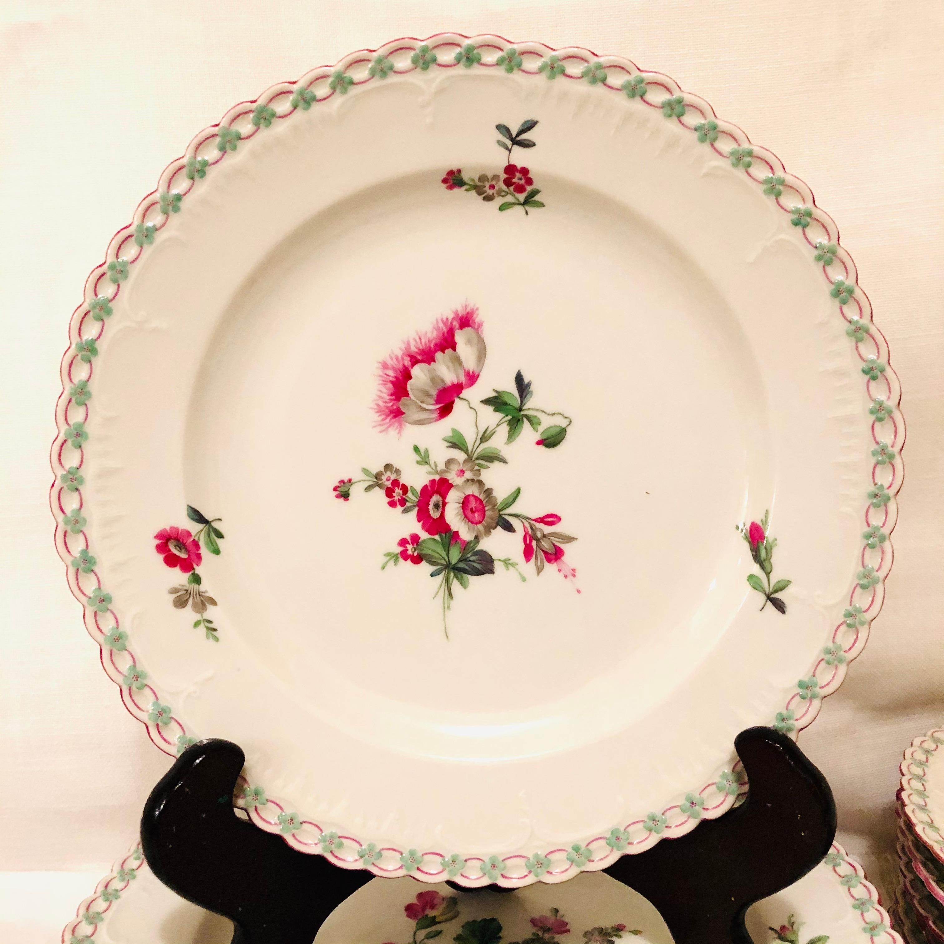 German Set of 13 KPM Dinner Plates Each Painted Differently With Raised Forget Me Nots