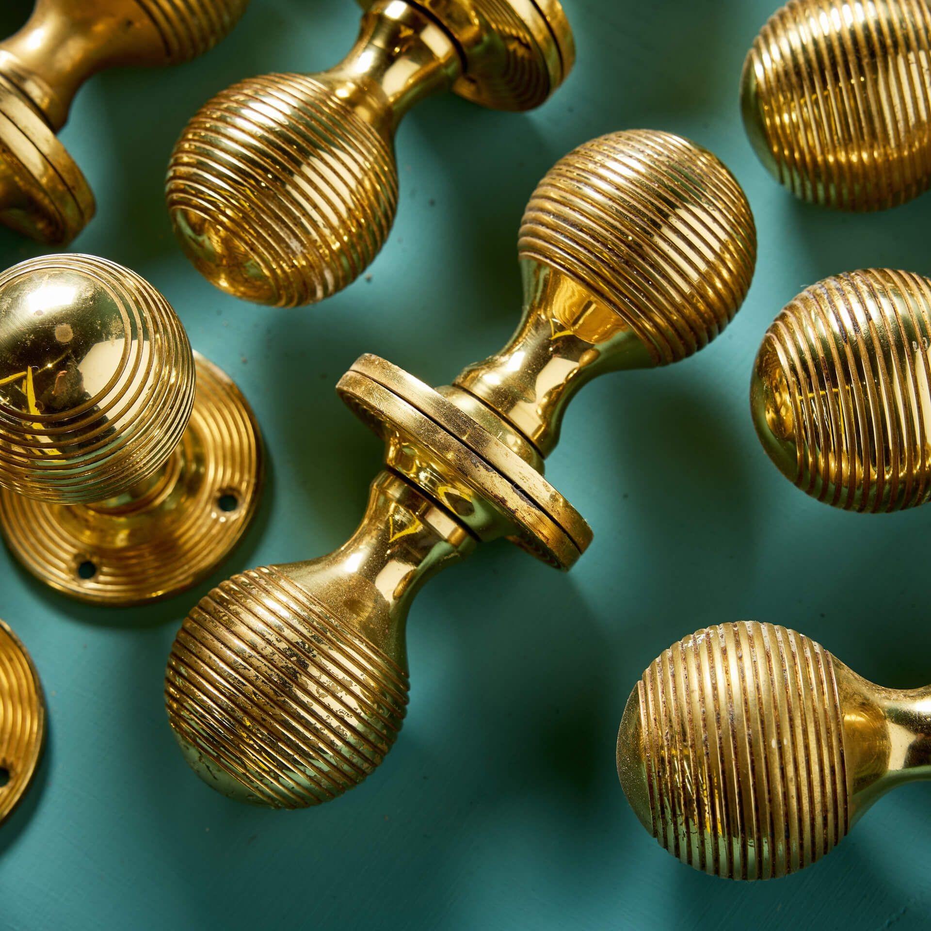 Metal Set of 13 Vintage English Brass Beehive Door Knobs For Sale