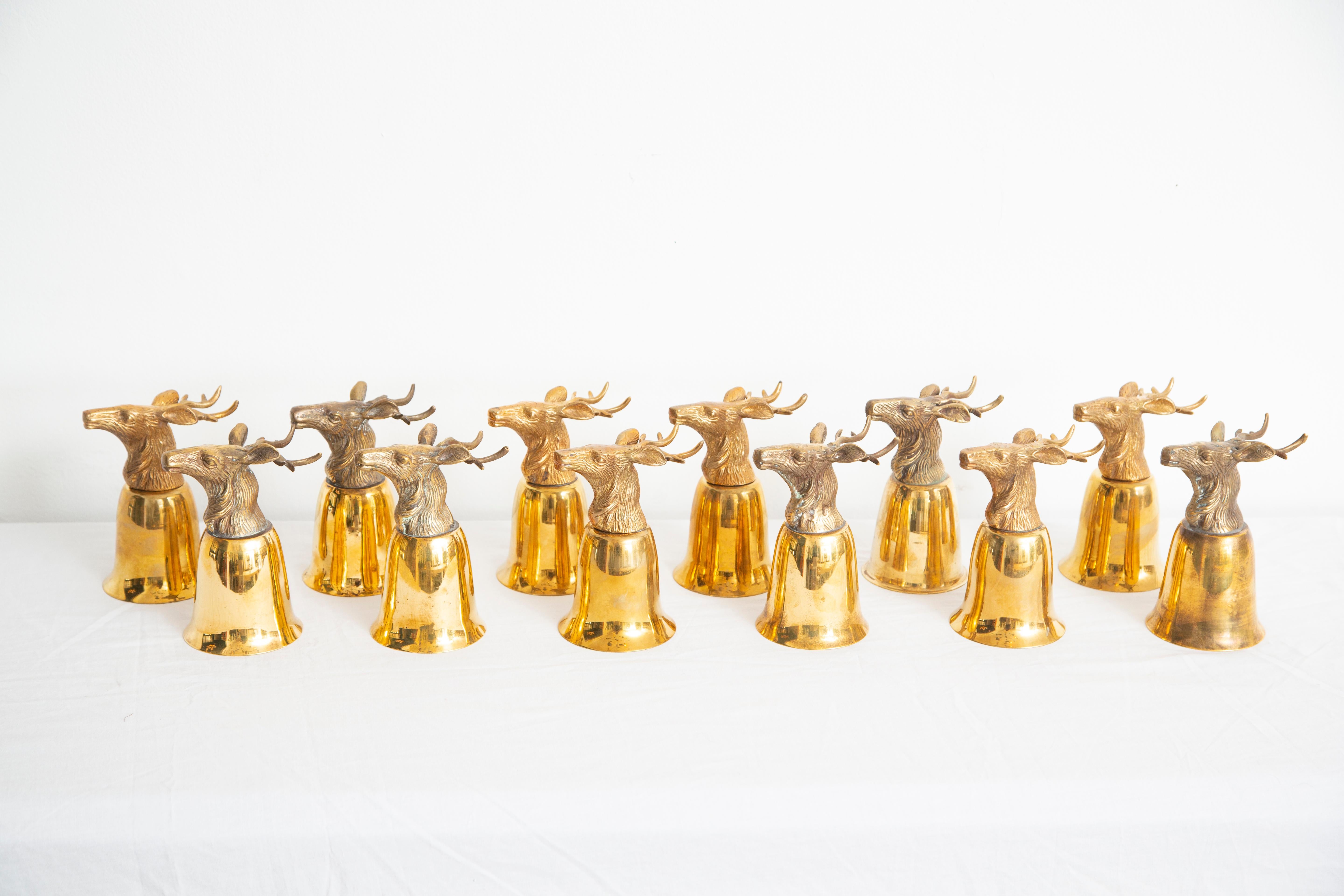 Set of 14 original brass patina goblets with elk/deer/stags heads.
 