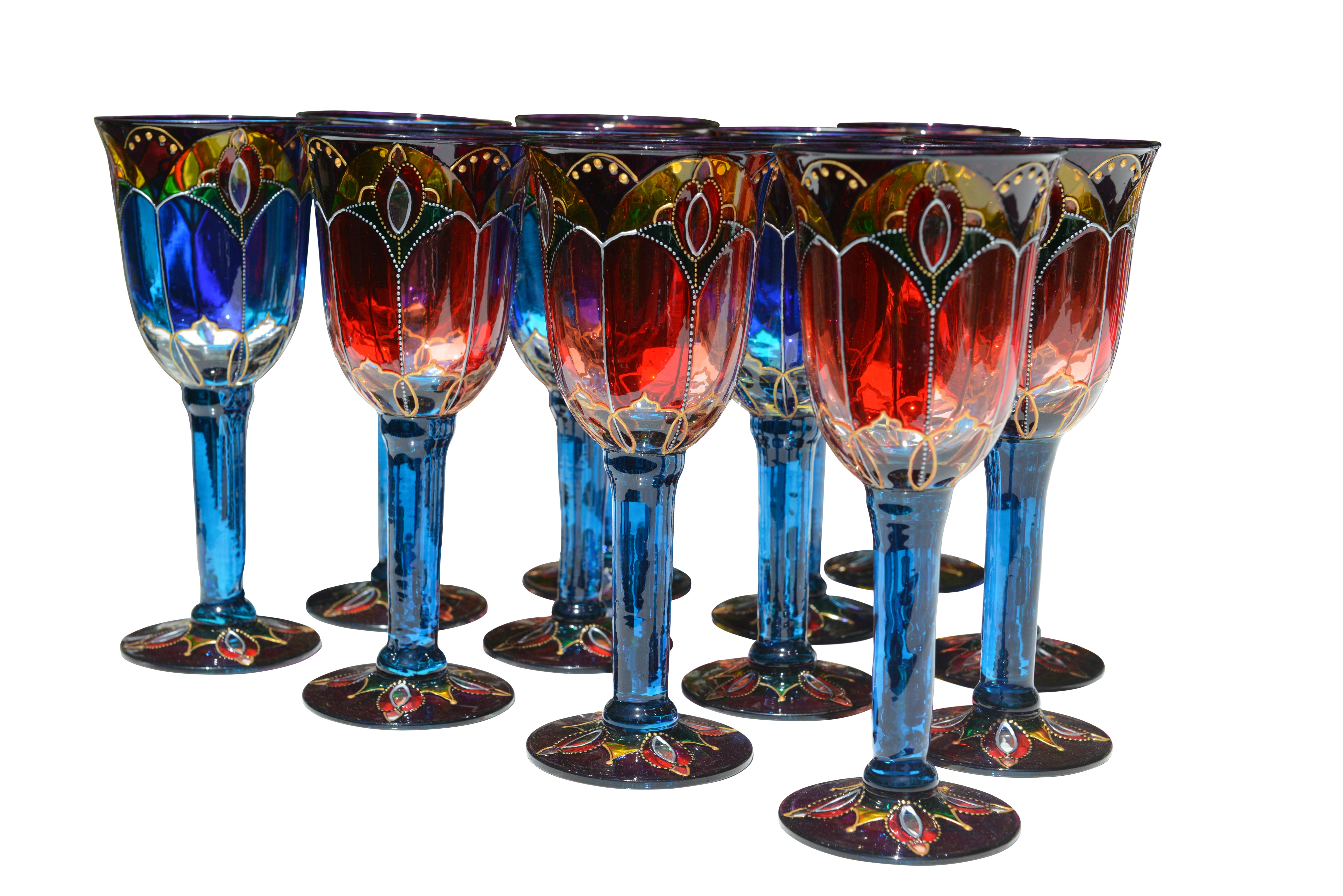 Striking set of 14 multi-color handprinted crystal glasses from Ibiza. Decorating crystal with hand painting in a centuries-old tradition in Spain. They are made by crystal painter specialists.