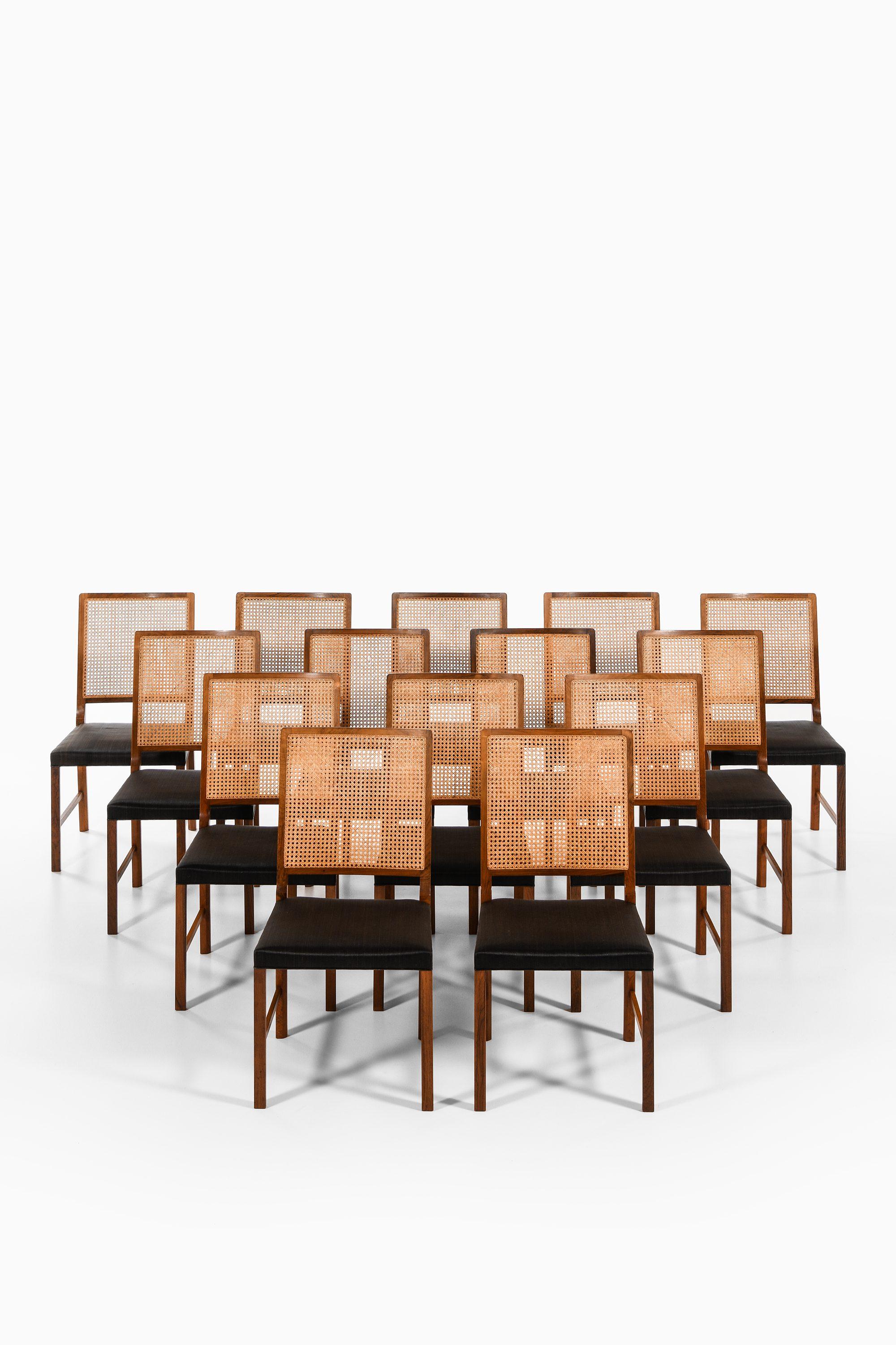 Set of 14 Dining Chairs in Rosewood and Cane by Bernt Petersen, 1960's For Sale 6