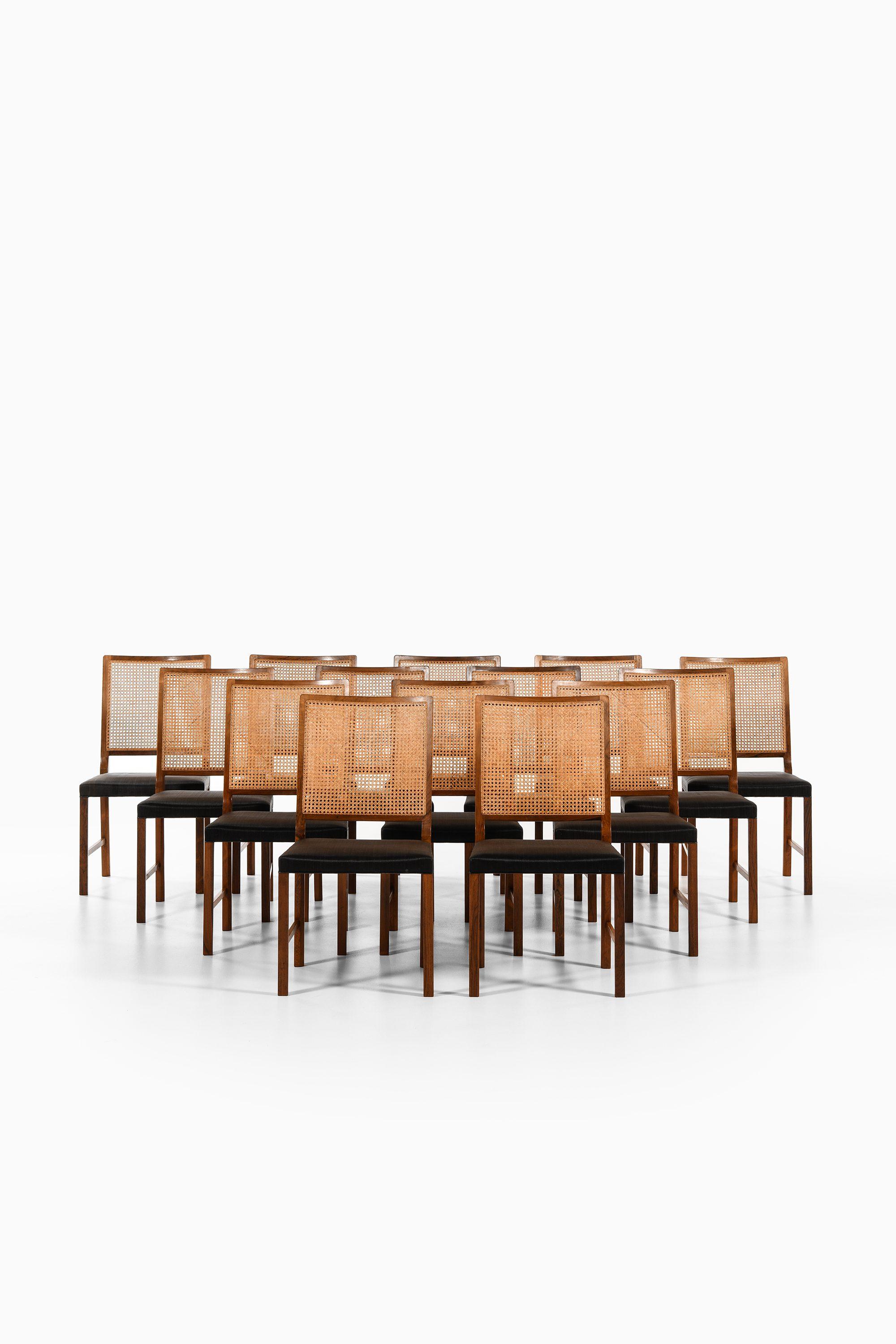 Set of 14 Dining Chairs in Rosewood, Cane and Horsehair Upholstery with Leather Piping by Bernt Petersen, 1960's

Additional Information:
Material: Rosewood, cane and horsehair upholstery with leather piping
Style: Mid century, Scandinavian
Very