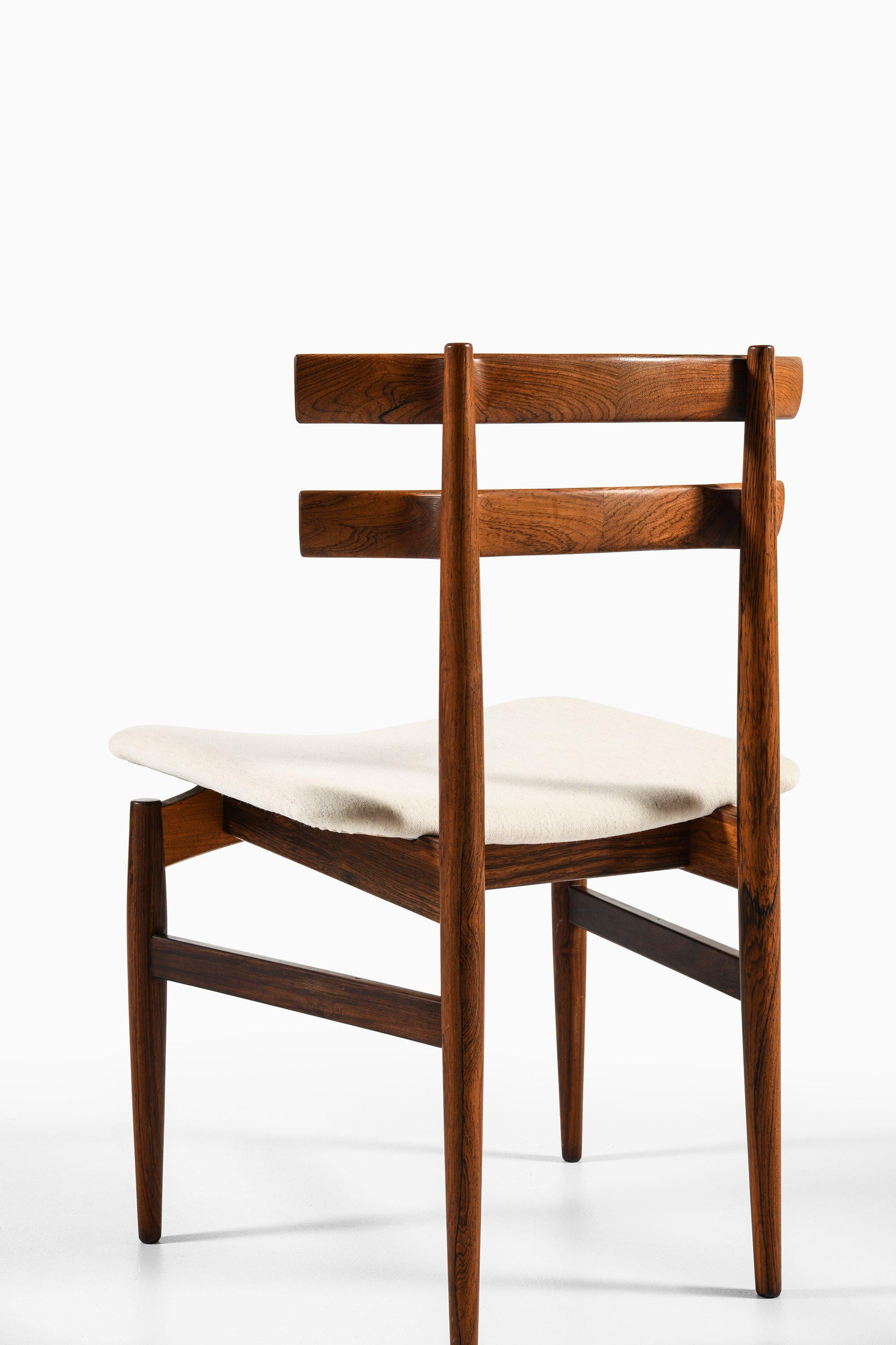 Danish Set of 14 Dining Chairs in Rosewood by Poul Hundevad, 1960's For Sale
