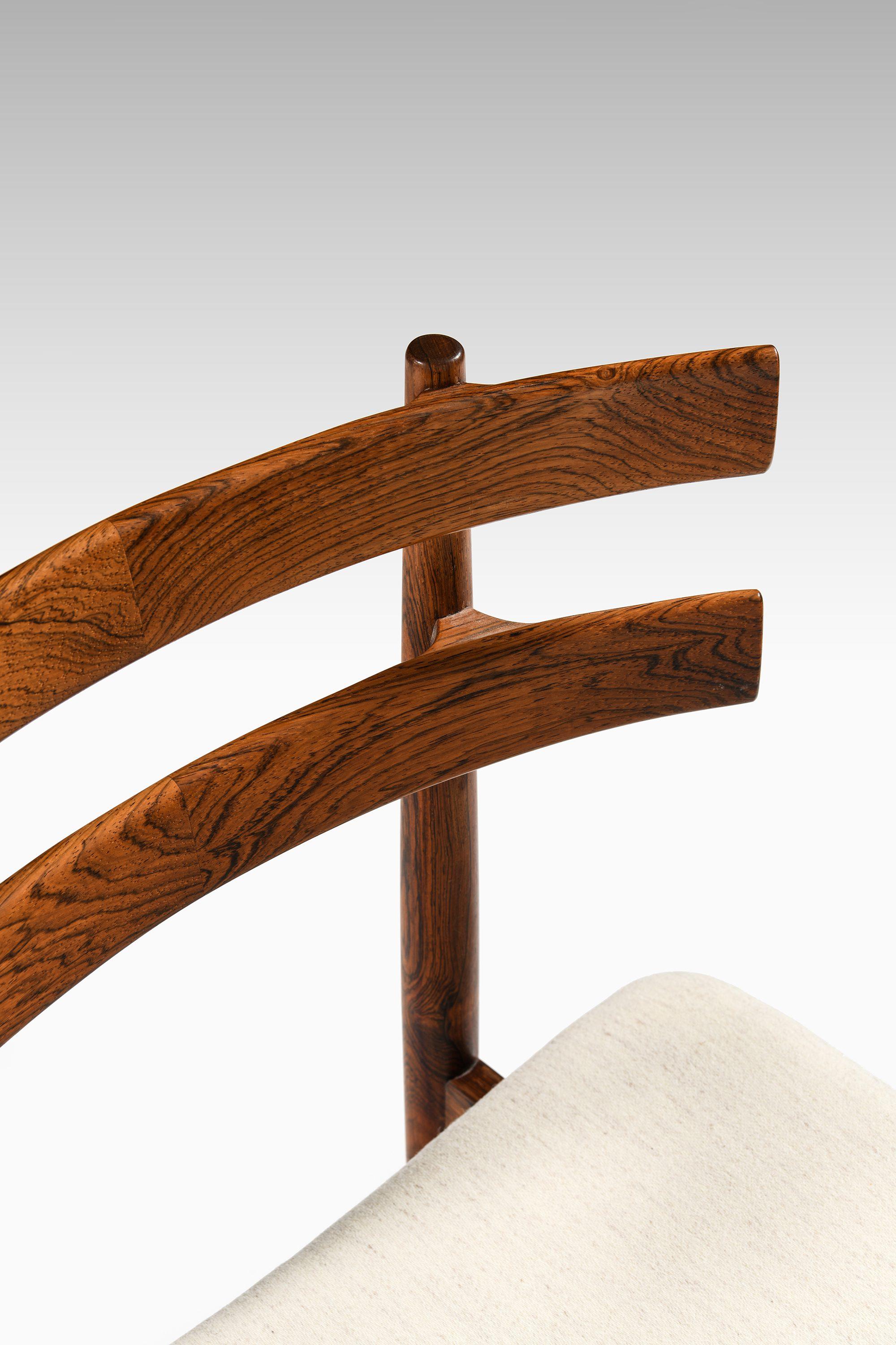 20th Century Set of 14 Dining Chairs in Rosewood by Poul Hundevad, 1960's For Sale