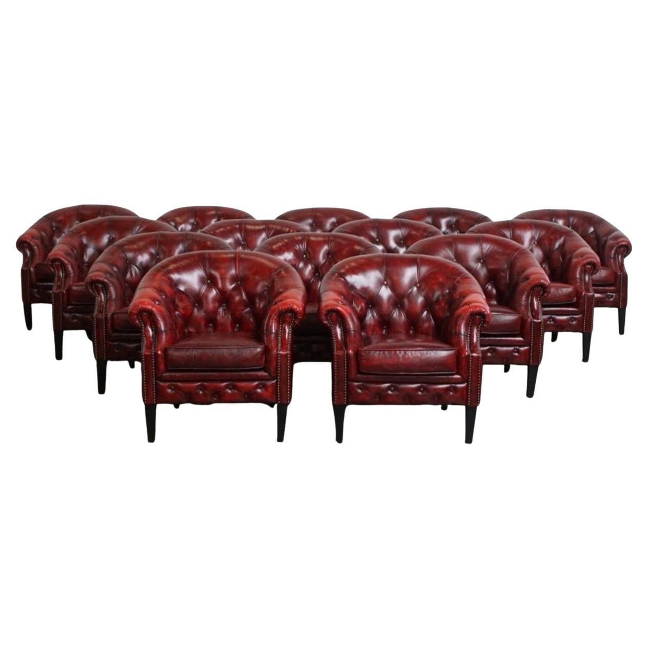 Set of 14 English Chesterfield Club Chairs in a Red Tone