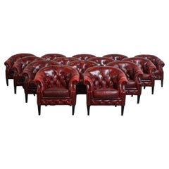 Set of 14 English Chesterfield Club Chairs in a Red Tone