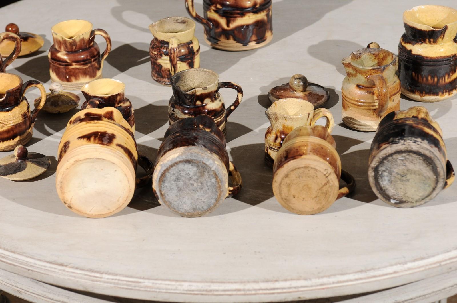 Set of 14 French Jaspe Pottery Creamers with Molted Mocha Finish, circa 1850 5