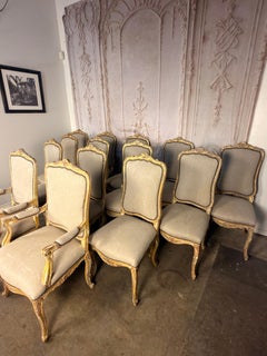 Set of 14 French Louis XV Style Gilt Dining Chairs with Linen Upholstery