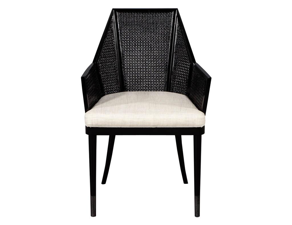 Set of 14 modern black cane dining chairs by Baker Kara Mann. Made by Baker furniture designed by Kara Mann modern with traditional elements cane dining chair, walnut finished in black lacquer and upholstered in a designer tweed fabric.

Chairs