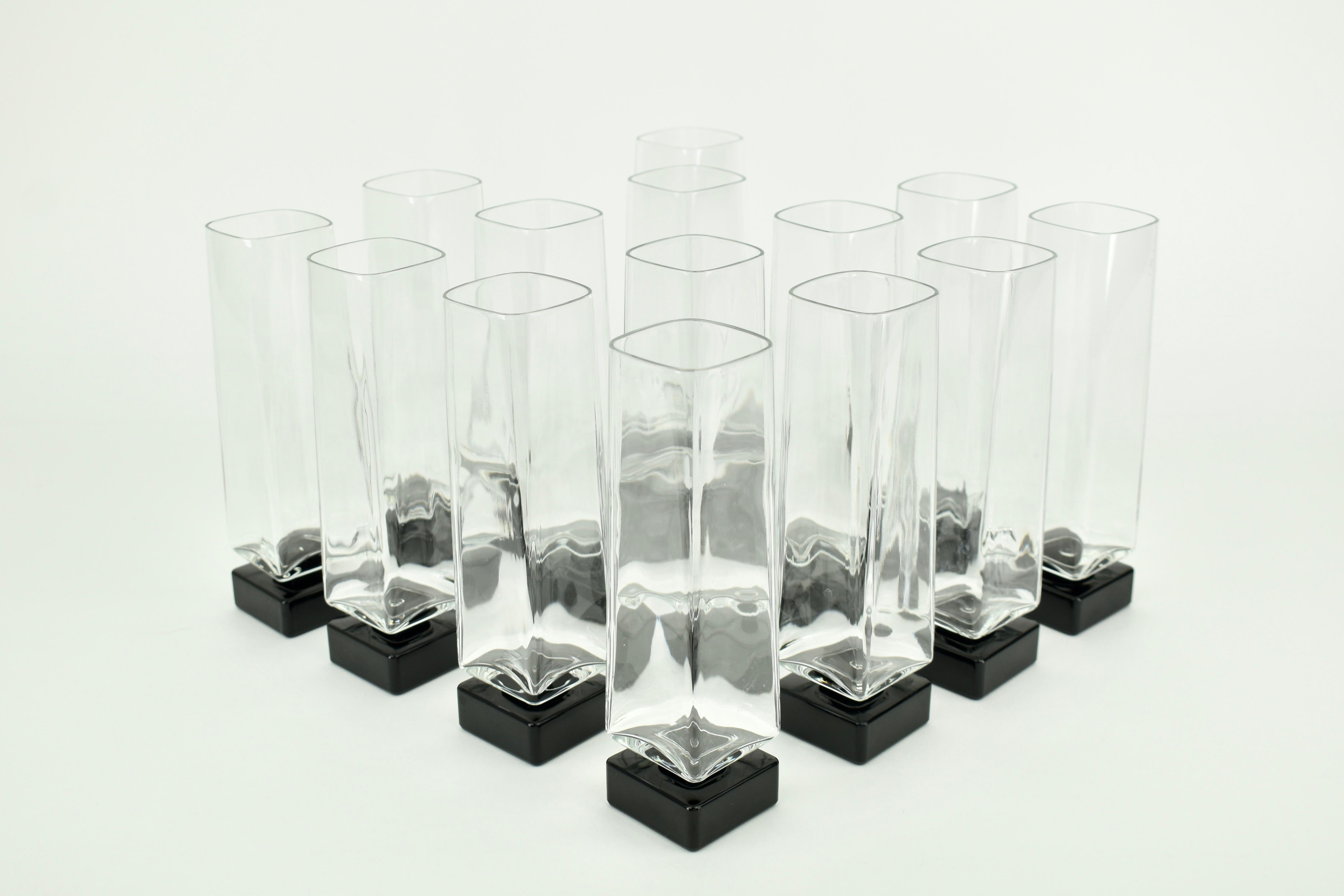 Elegant set of 14 crystal champagne flutes by Luigi Bormioli, Italy, circa 1980s.
A refined and timeless Italian design, crafted in brilliant crystal. This complete set of 14 identical flutes is in excellent condition, free from chips or