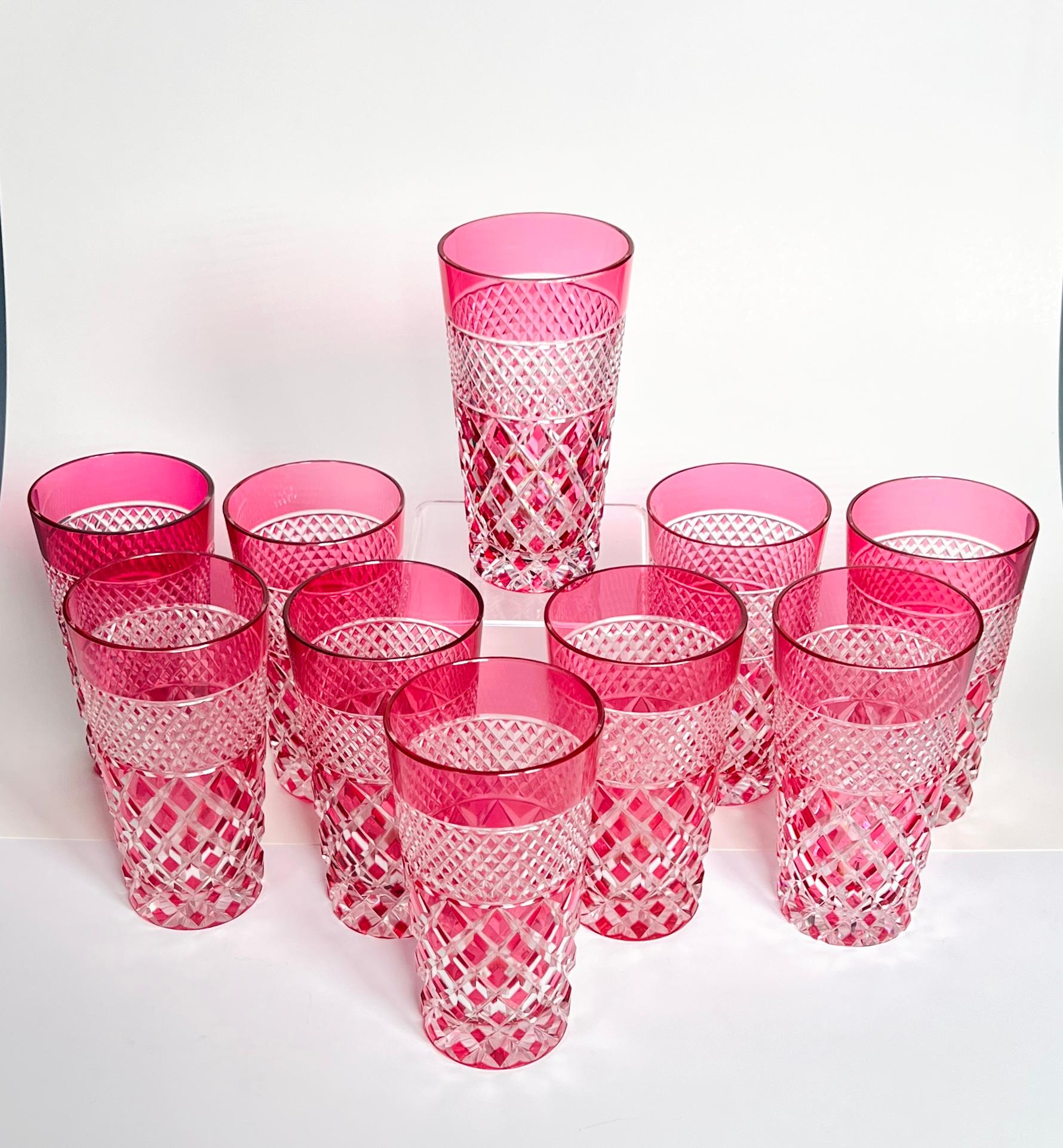 Elevate your table setting with these antique St. Louis crystal tumblers. The perfect size for your favorite beverage and the exquisite cranberry overlay is cut to clear in this classic diamond pattern. These feel great in the hand and will also