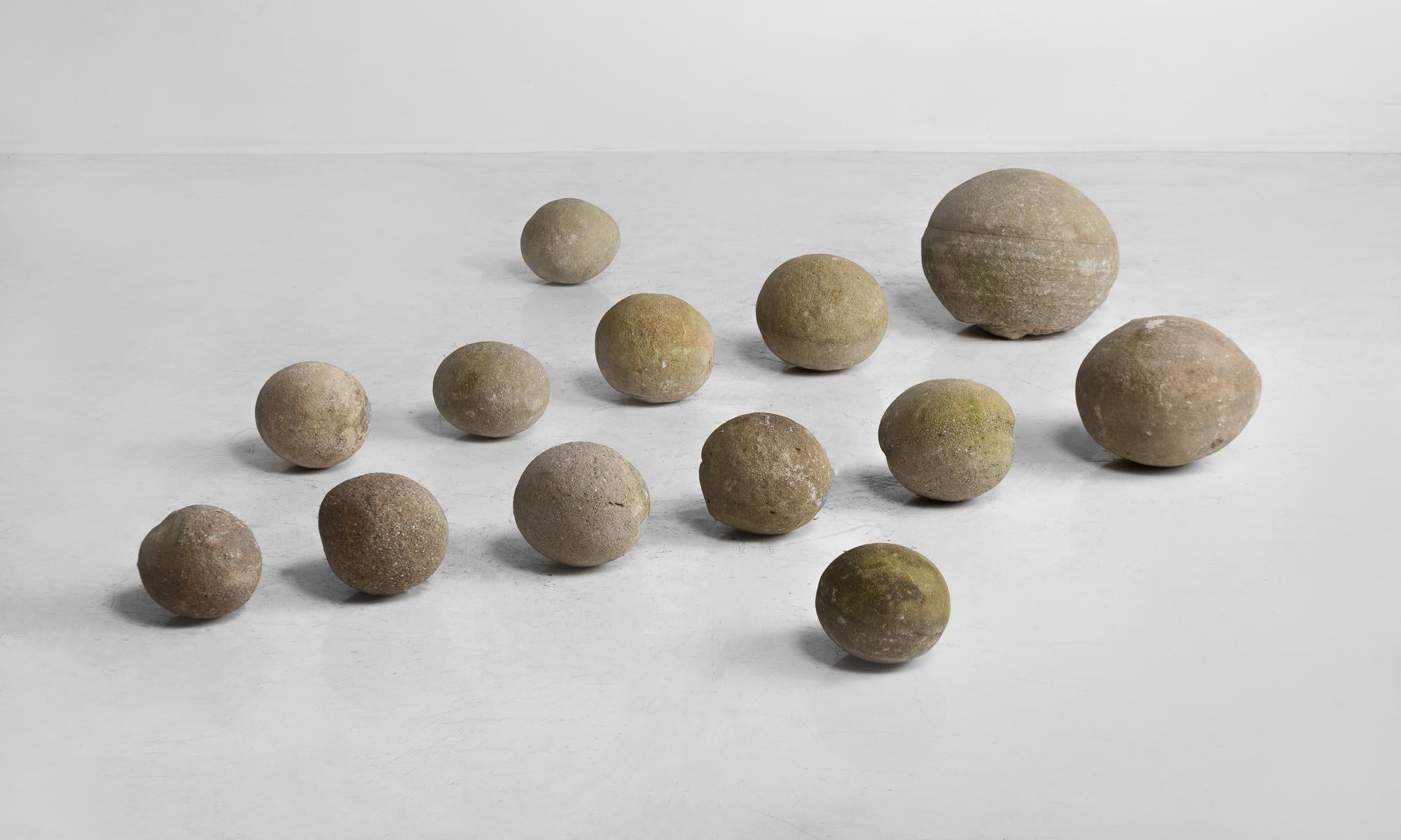 Set of (14) stone balls, France, circa 1840.

Set of cast stone balls of varying sizes with unique patinas.

Measures: 12