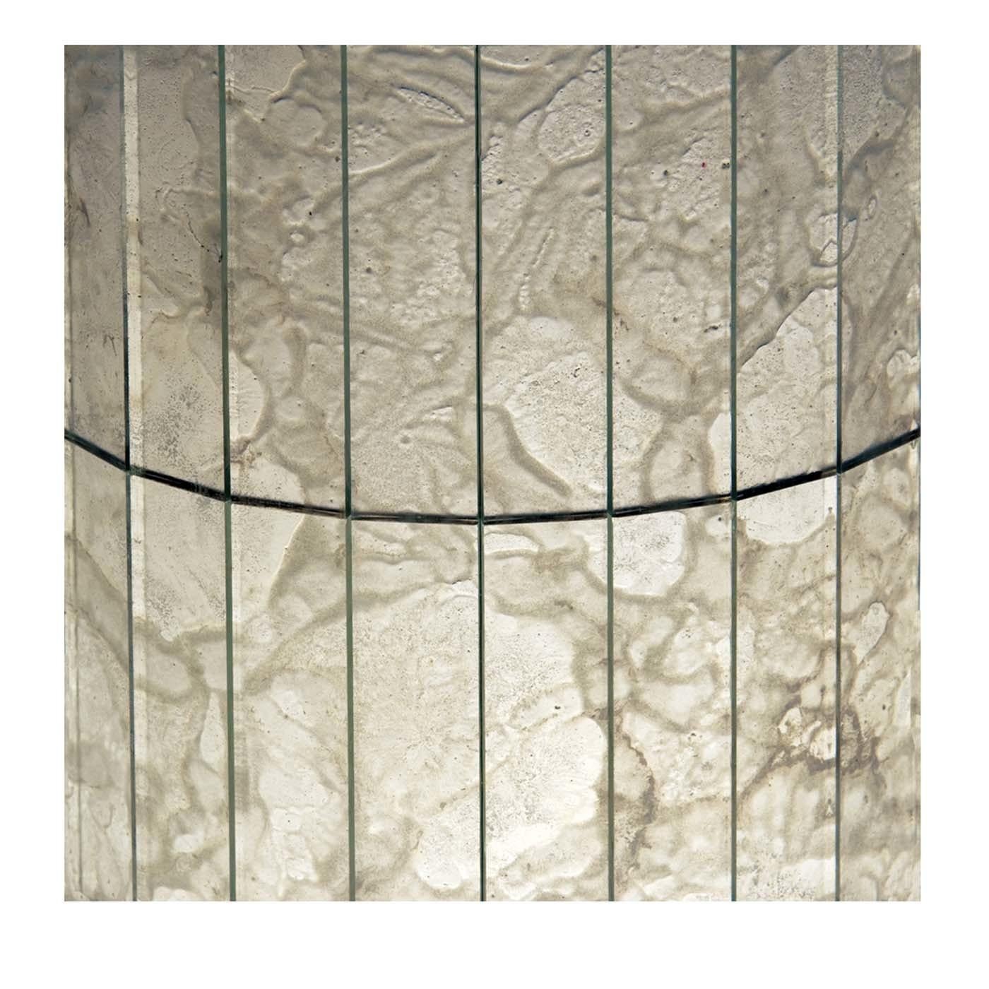 The glimmering and moving elegance of this set of canvased mosaic glass panels in the Damask series cannot be passed unobserved. Its swirling shapes of light and shade will add luminescence and luxuriousness to walls in both modern and traditional