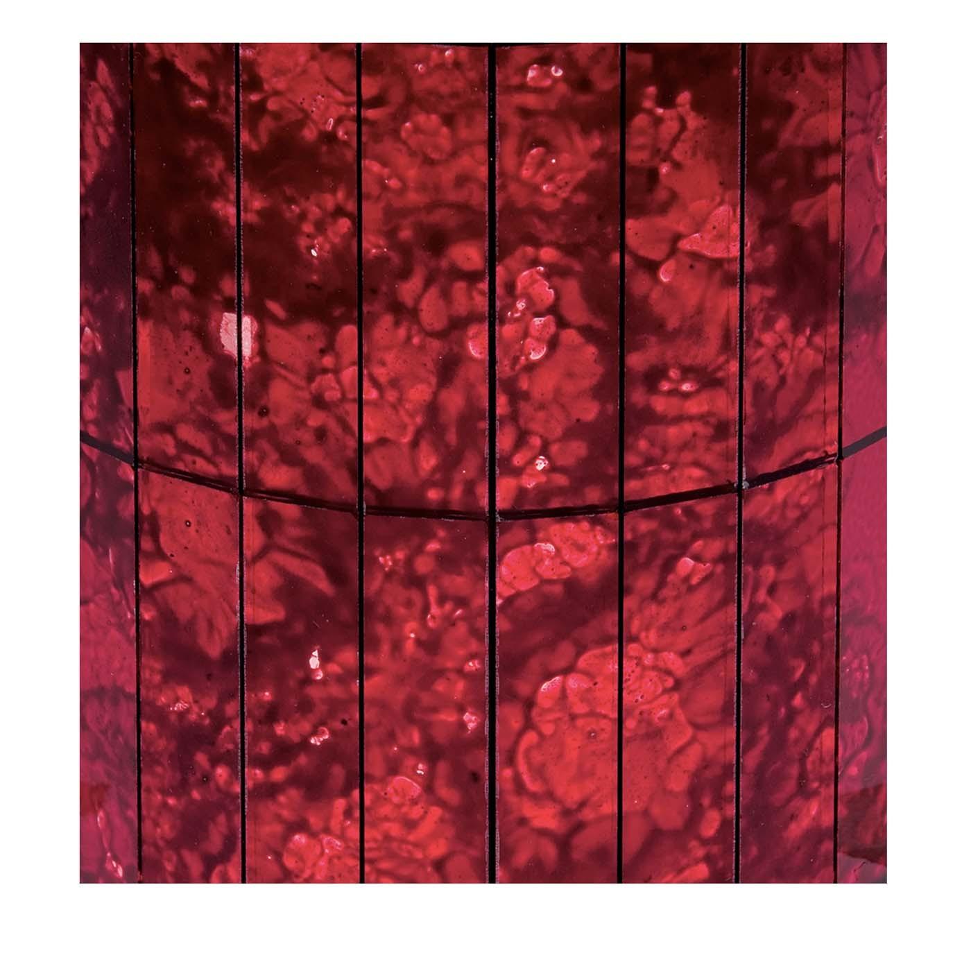 Antique Mirror has hit the mark with the striking shades of red on these canvased mosaic glass panels. The tones from light to ruby to dark red are dramatic and powerful and create an emotionally vivid atmosphere in any room in a modern home. Each