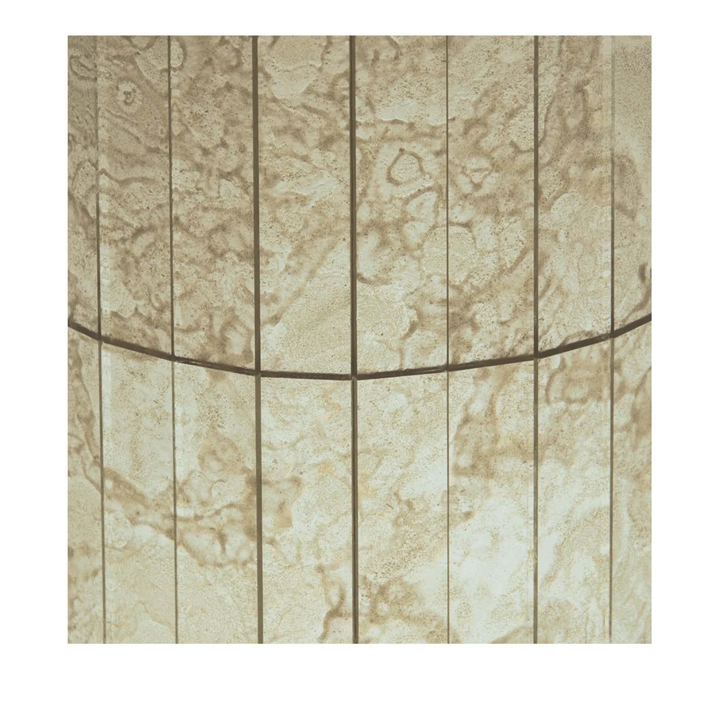 These time-weathered and delicately colored canvased mosaic glass panels by Antique Mirror are made up of wispy and swirling shades of white, gray, and gold. It will add a romantic and romantic accent to walls in both modern and traditional homes.