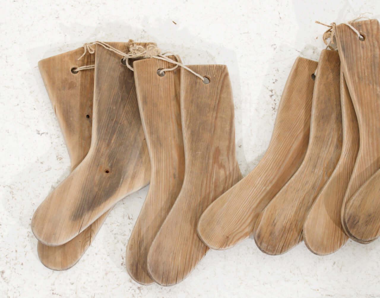 Charming set of 15 wooden socks decorations, 19th Century.