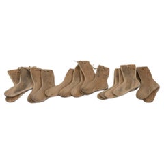 Ensemble de 15 chaussettes décorées en bois, 19e siècle