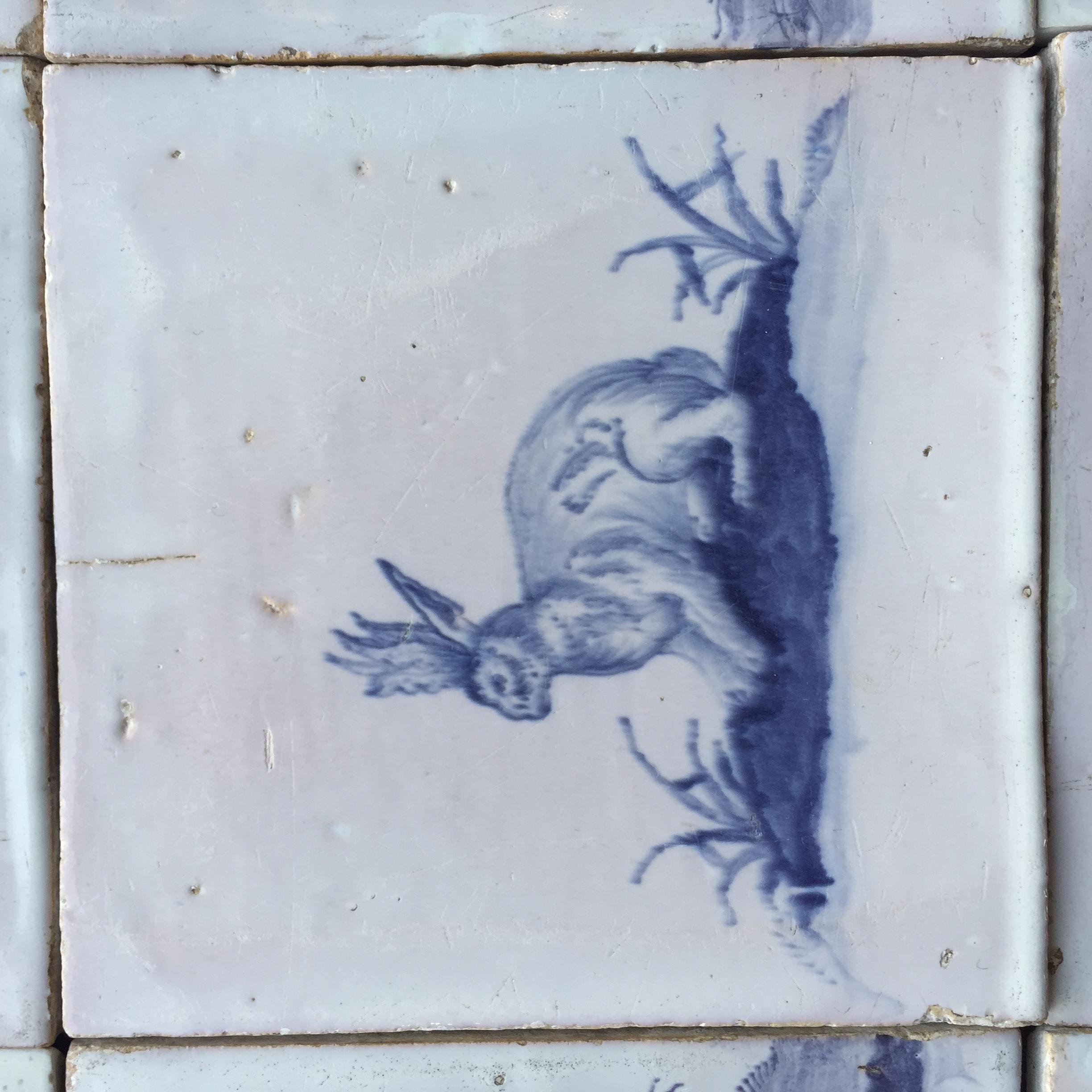 Ceramic Set of 16 Blue and White Delft Tiles with Animals and Figures, 18th Century For Sale