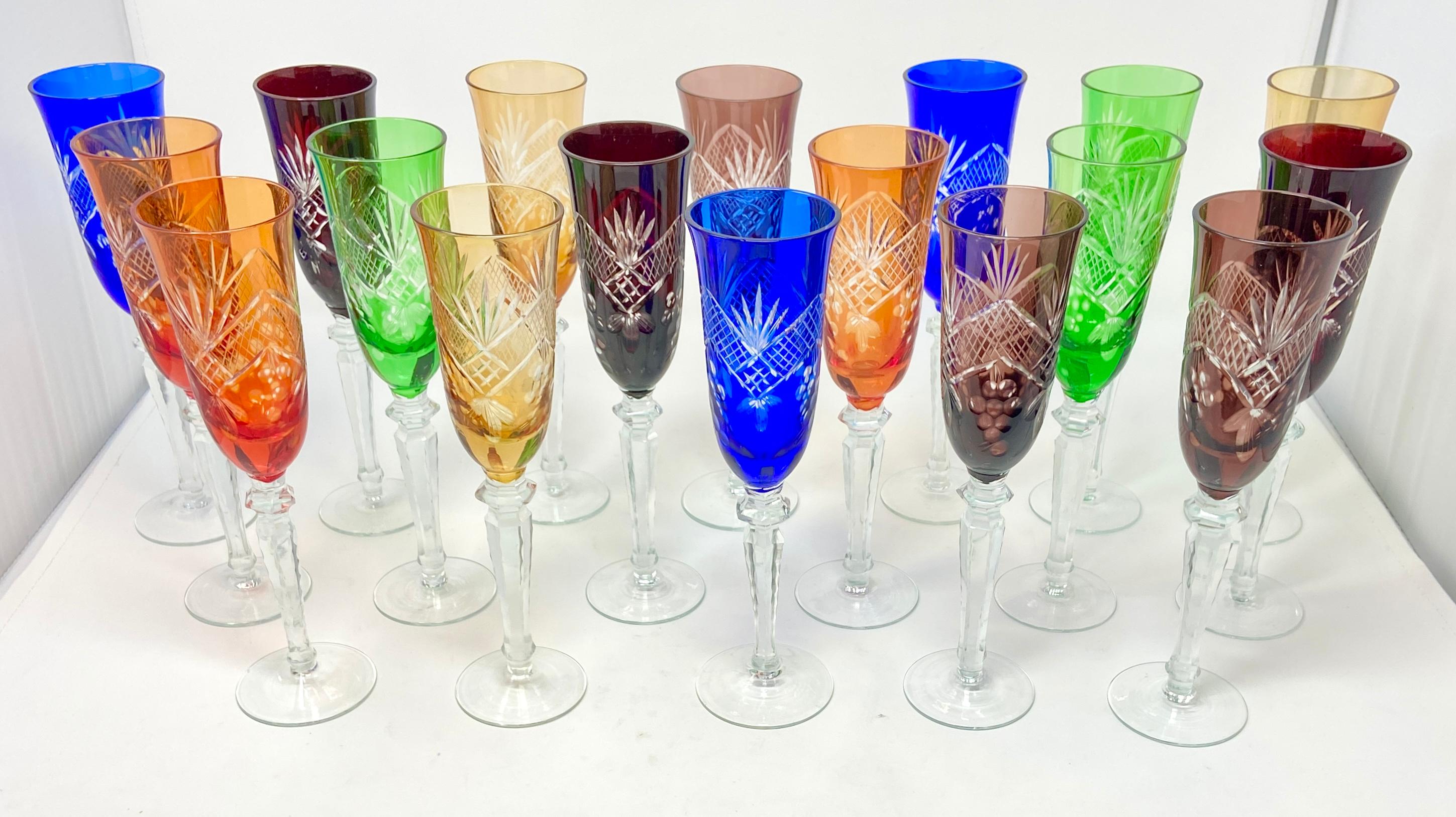 Set of 16 Bohemian multi-colored cut to clear glass champagne goblets.
These beautiful champagne glasses come in 6 bright colors: cobalt blue, ruby red, kelly green, golden yellow, persimmon orange and soft violet.