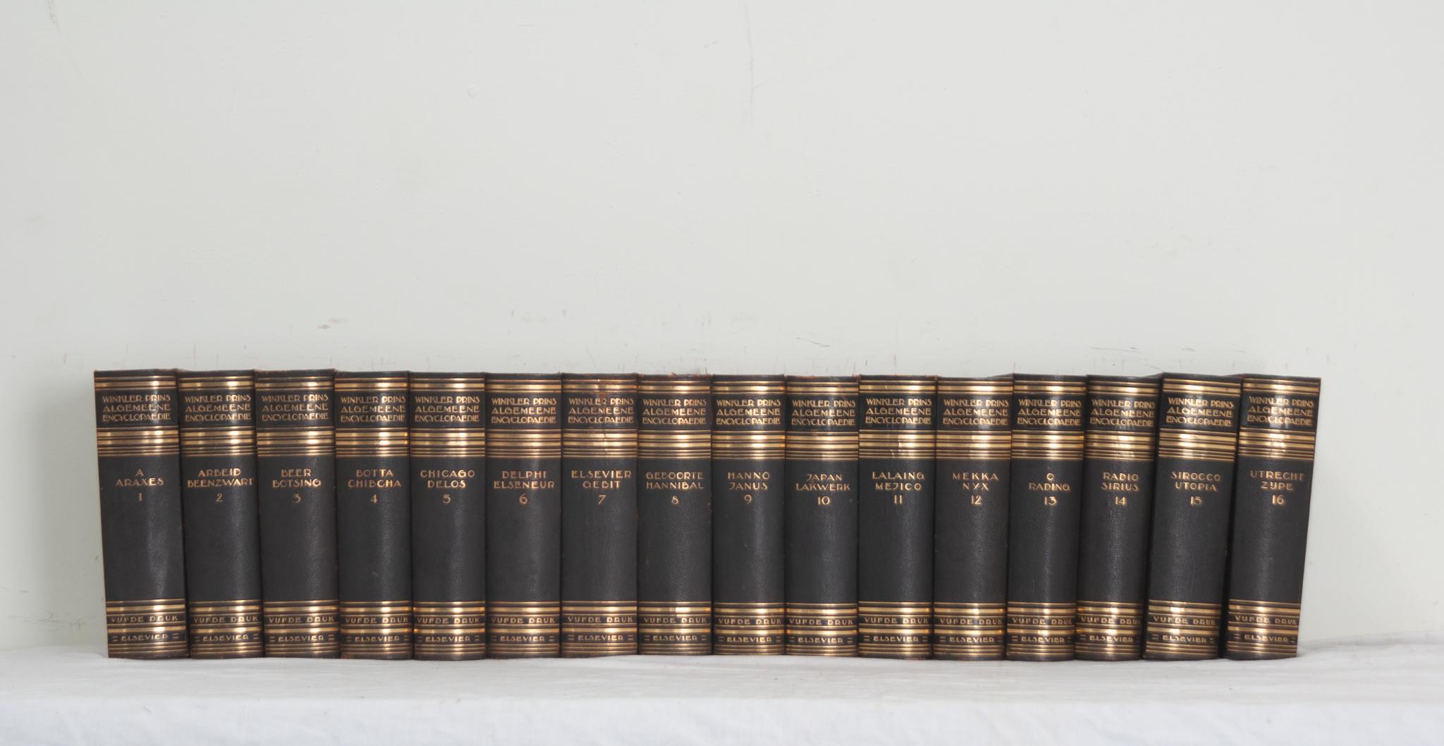 A collection of sixteen volumes of a Dutch encyclopedia set published from 1932-1938.  This set of books is leather bound with the Dutch title; Winkler Prins Algemeene Encyclopaedie, and respective volume number stamped in gold lettering. The pages