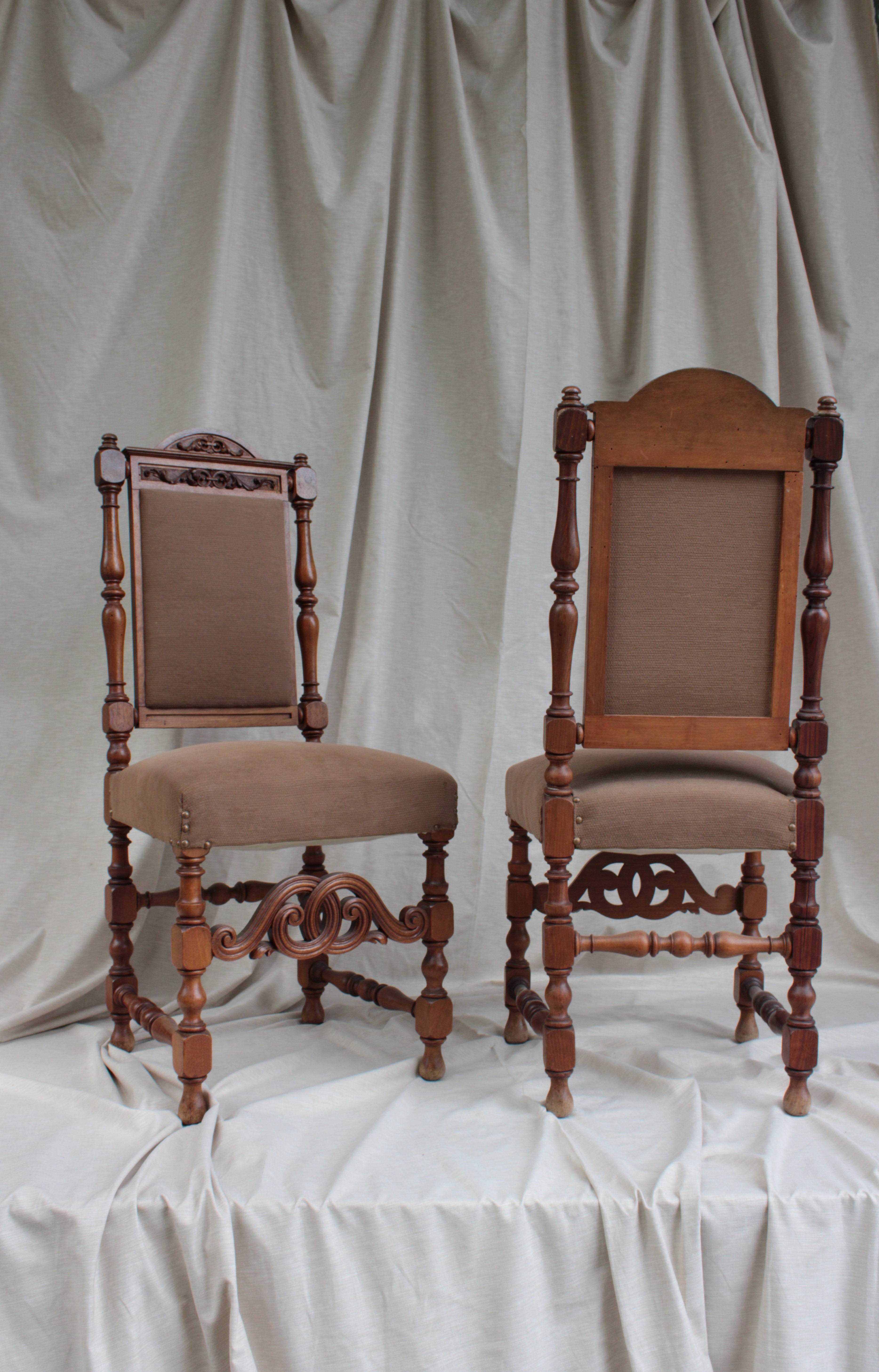 Set of 16 wooden chairs. Cropped backrests decorated with plant motifs, flanked by turned columns. It rests on four turned legs joined by crosspieces and winding headband. Seats and back upholstered in fabric in shades of brown.