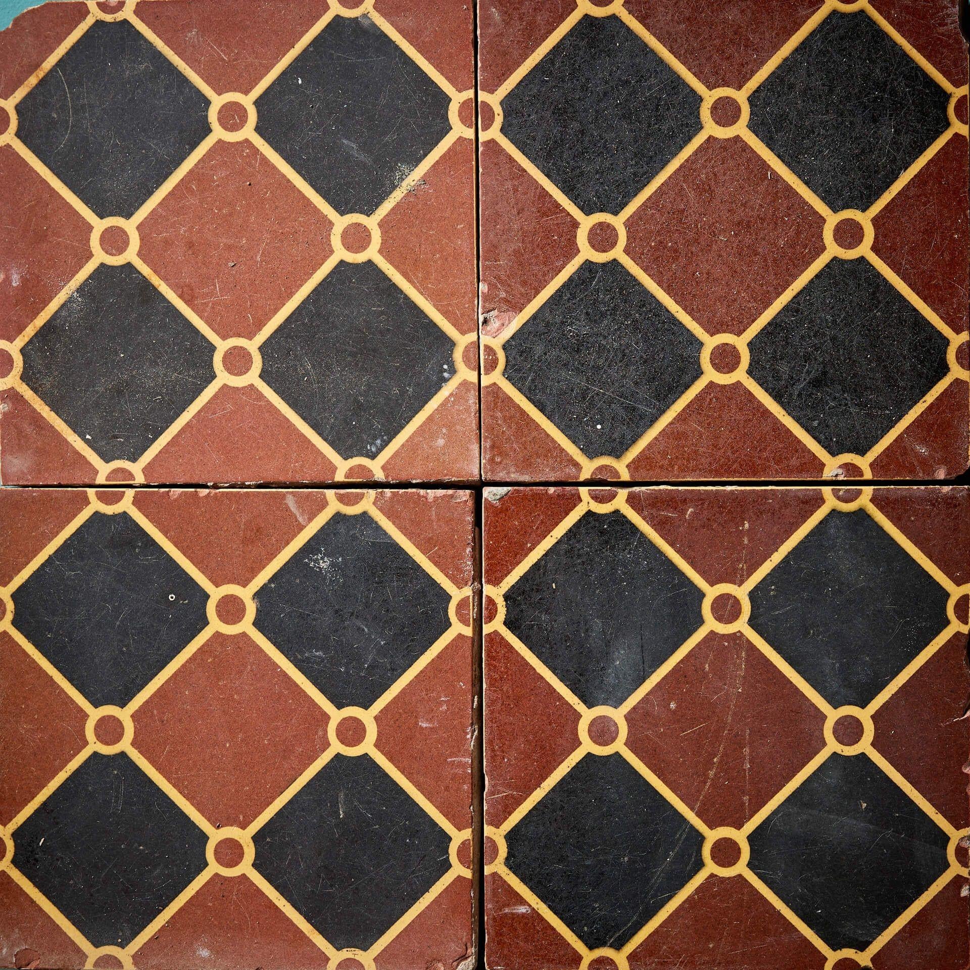 Victorian Set of 16 Reclaimed Patterned Encaustic Tiles by Godwin For Sale