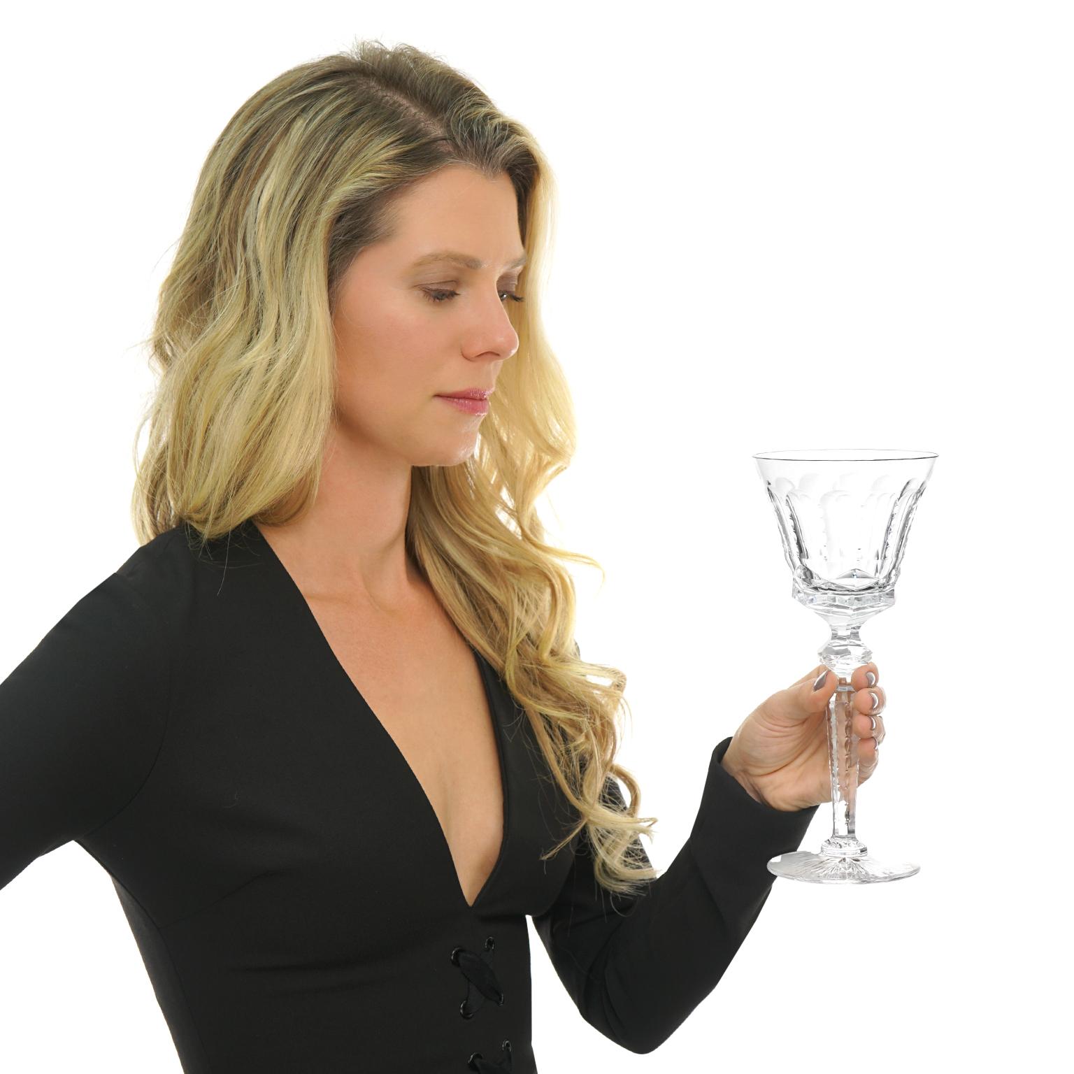 By St. Louis, crystal, France. Magnificently tall and fulsome, these stunning St. Louis water goblets are a rare variant of the renowned “Excellence” pattern, circa 1967. They feature sublime hand-cutting and opulent good looks. Setting a memorable