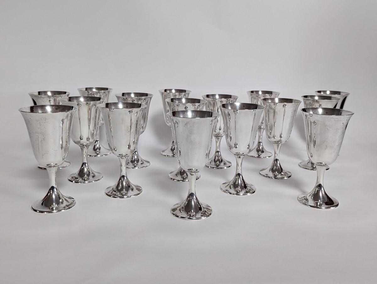 Maker: Gorham
Composition: Sterling Silver
Type: Water Goblets (Gold Wash)
Pattern: Puritan
Markings: GORHAM STERLING 272
Monogrammed: No
Number of Pieces: 16
Measurements: 6.5″H
Goblets weighed in sets of 8.  53.220 ounces & 53.185 ounces
TOTAL