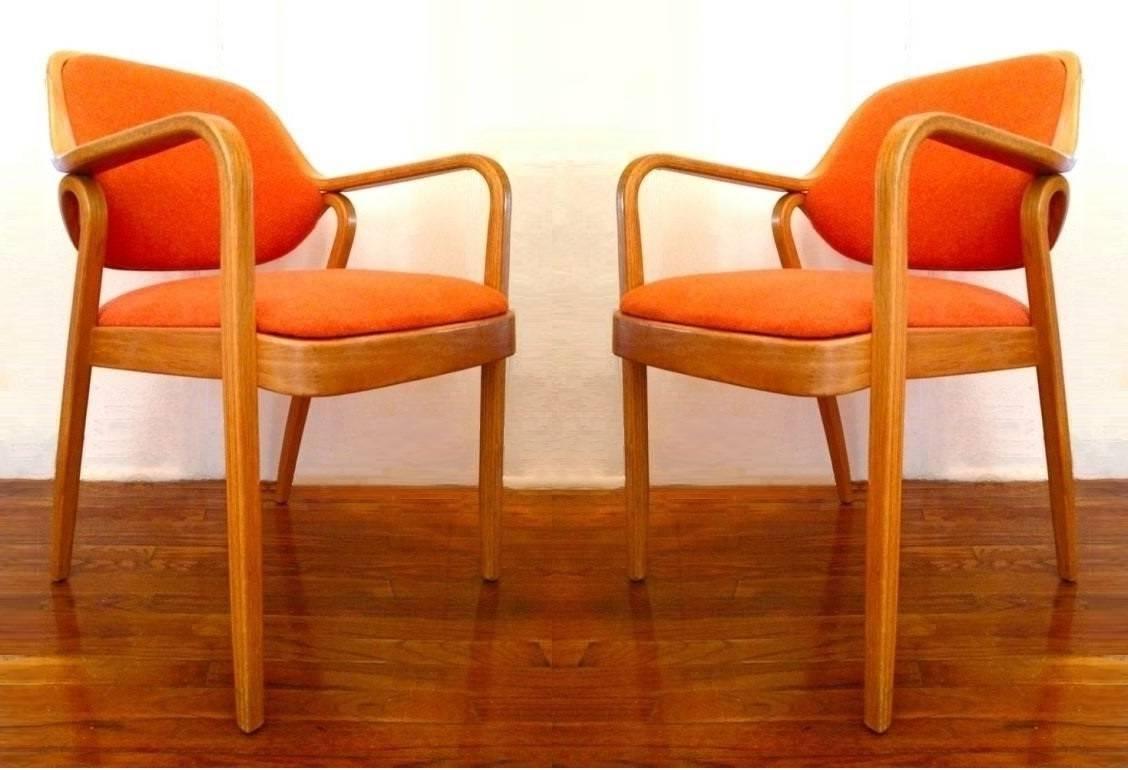 bentwood armchairs by Don Pettit for Knoll. Two lengths of pressed and bent layers of sculpted wood make up the legs and arms as well as the seat back frames. These chairs can be used as side chairs, dining chairs or office chairs. Simple, yet