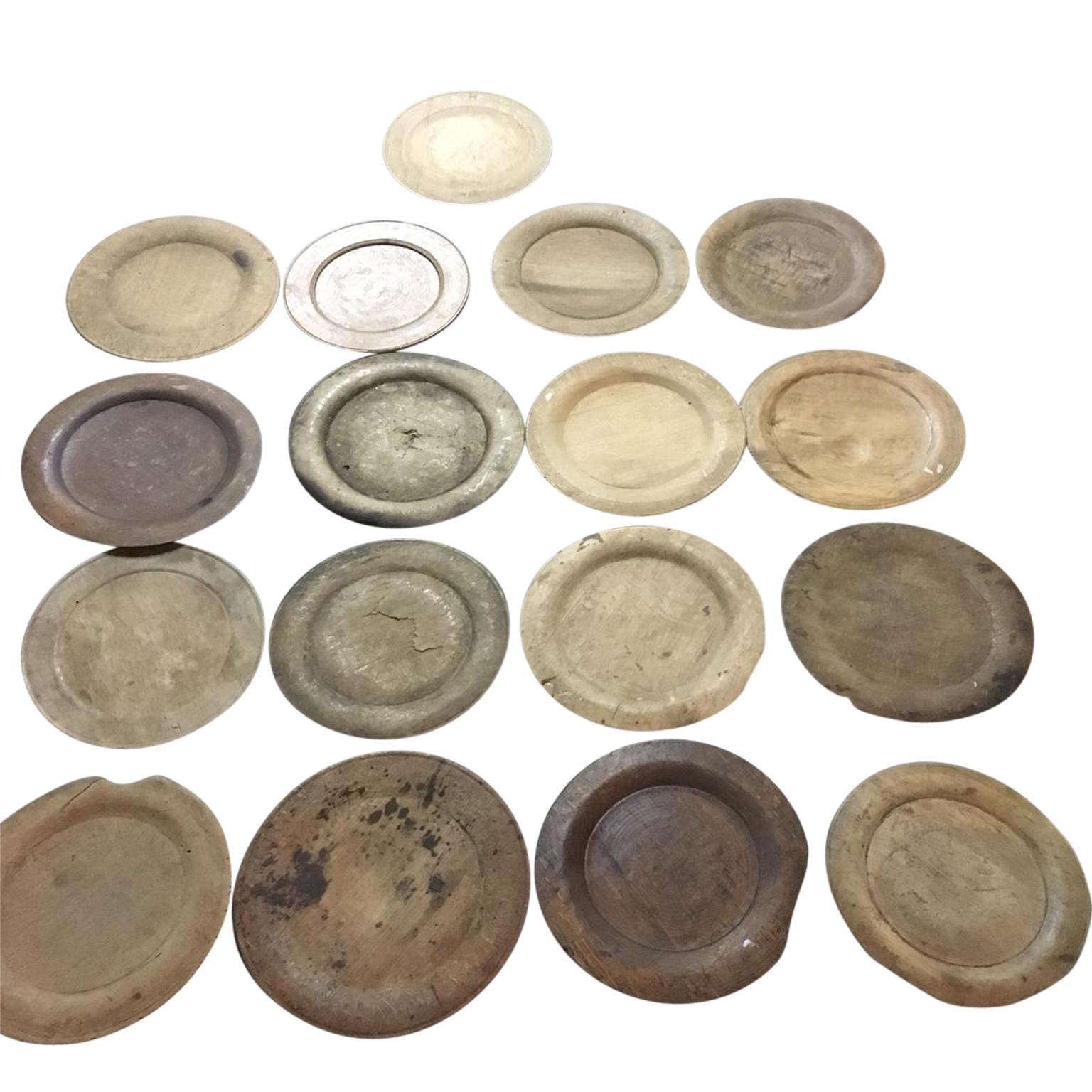 14 rustic Folk Art dinner plates of wood, circa 1780s-1830s available
Could be used for trays, serveware or under-plates.

Pricing is per item.

Diameter of the plates range from 17cm to 19cm (between 6.7 inches and 7.5 inches), most of the plates