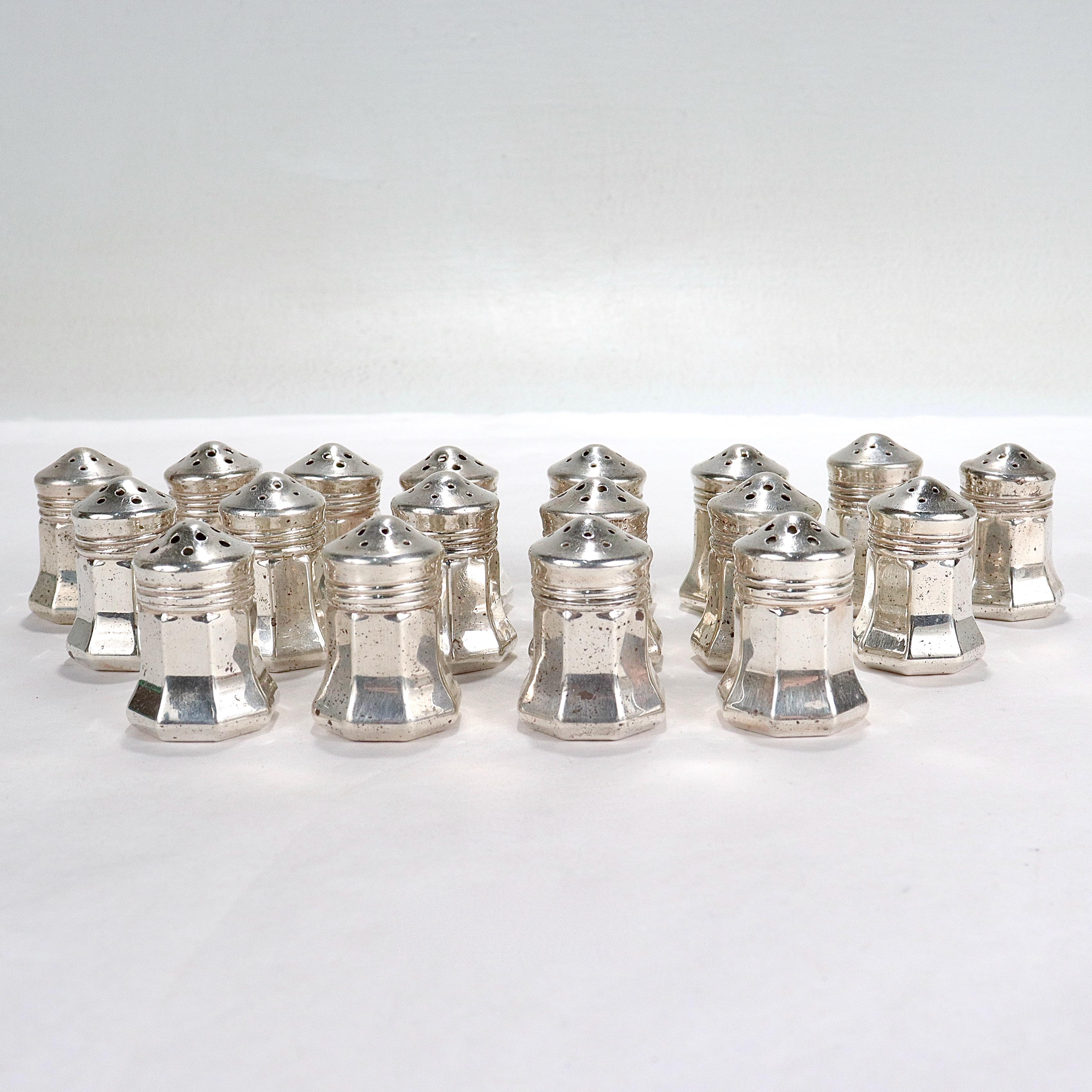 A fine set of 18 silver salt & pepper shakers.

By Cartier.

In sterling silver.

With each marked Cartier / Sterling to the base.

Overall Condition:
They are in overall fair, as-pictured, used estate condition.

Condition Details:
There are some