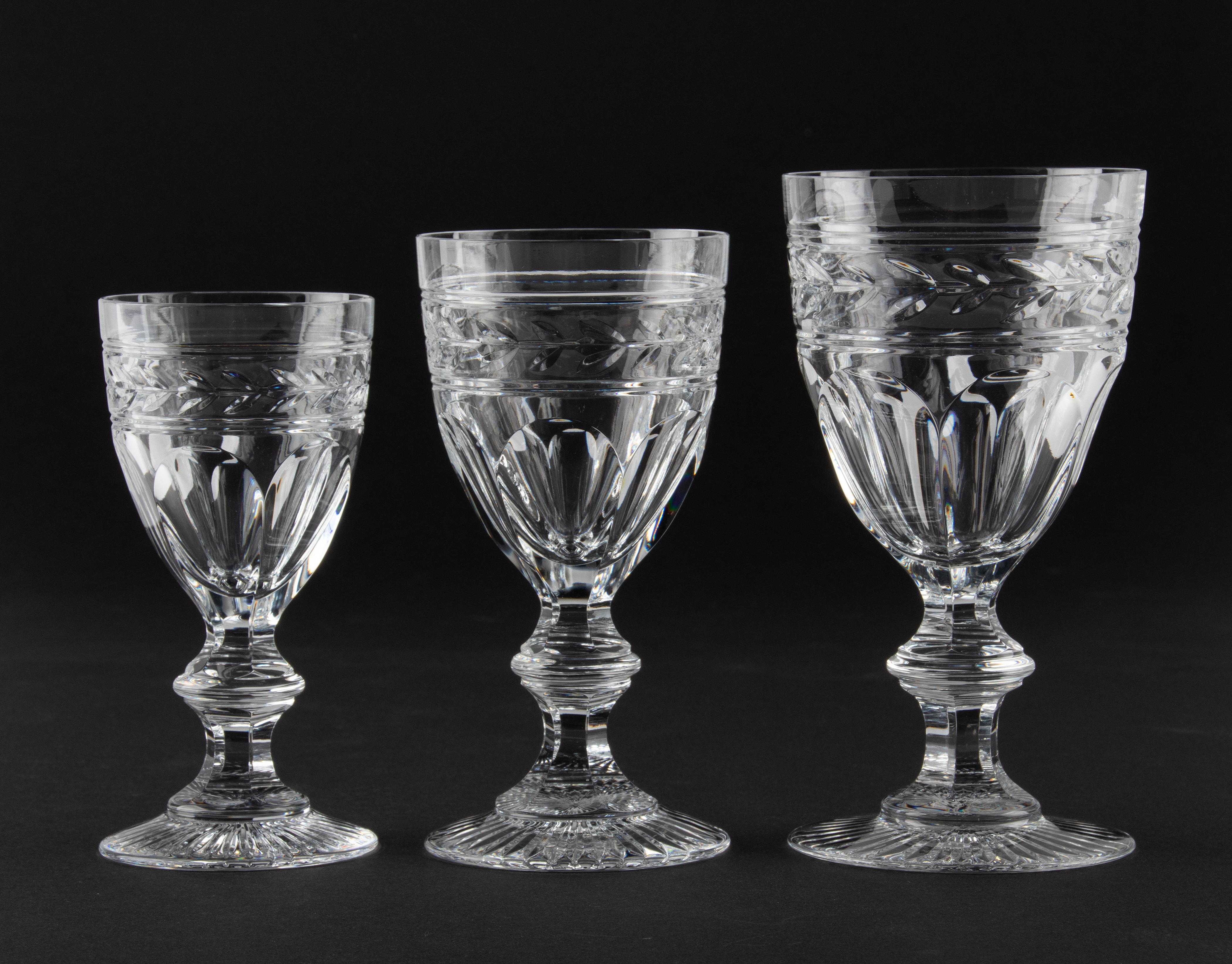 Beautiful set of wine glasses from the French maker Baccarat. The model's name is Jonzac. The crystal is of a beautiful quality, with beautiful cut edges with laurel leaves. The set consists of 3 x 6 glasses: water glasses, glasses for red wine and