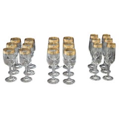 Set di 18 bicchieri di cristallo con decorazione raffinata e bordo dorato
