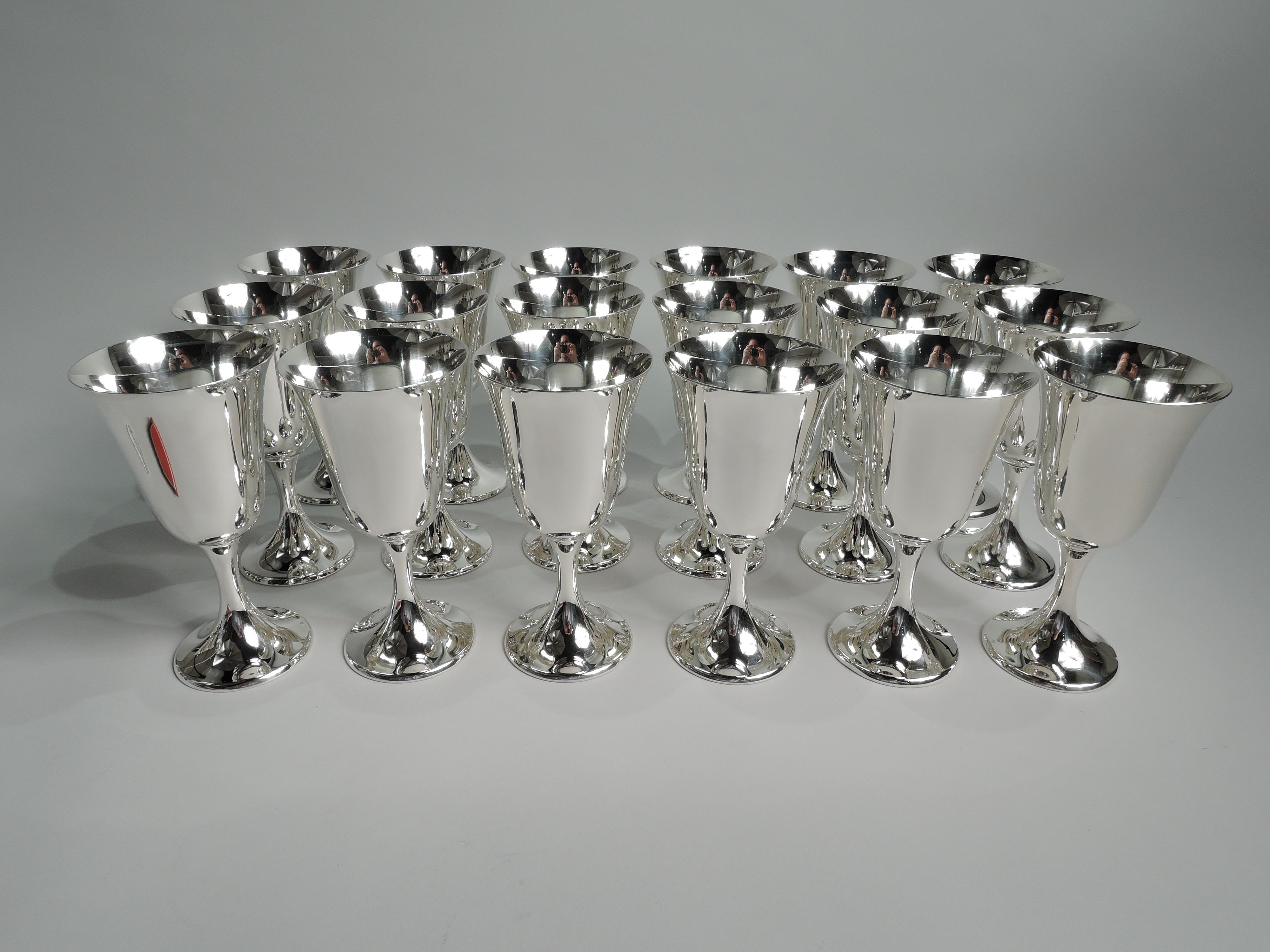 Set of 18 Puritan sterling silver goblets. Made by Gorham in Providence. Each: Spare and elegant form with subtle bell-form bowl on cylindrical stem flowing into raised foot. Works best when filled and refilled. Don’t be fooled by the pattern name.