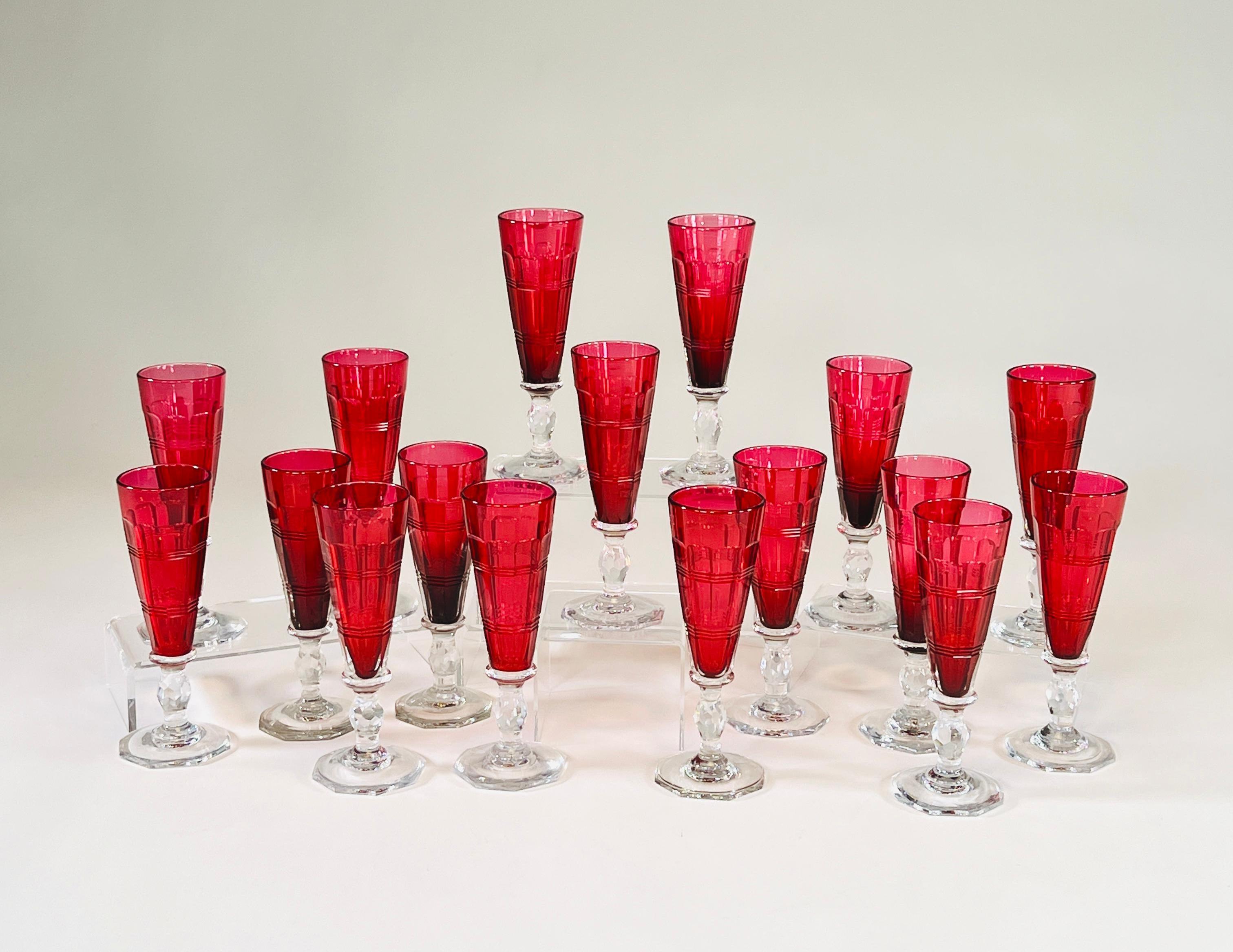 Art Deco Set of 18 Hand Blown Crystal Cranberry Champagne Flutes With Clear Stems & Base For Sale