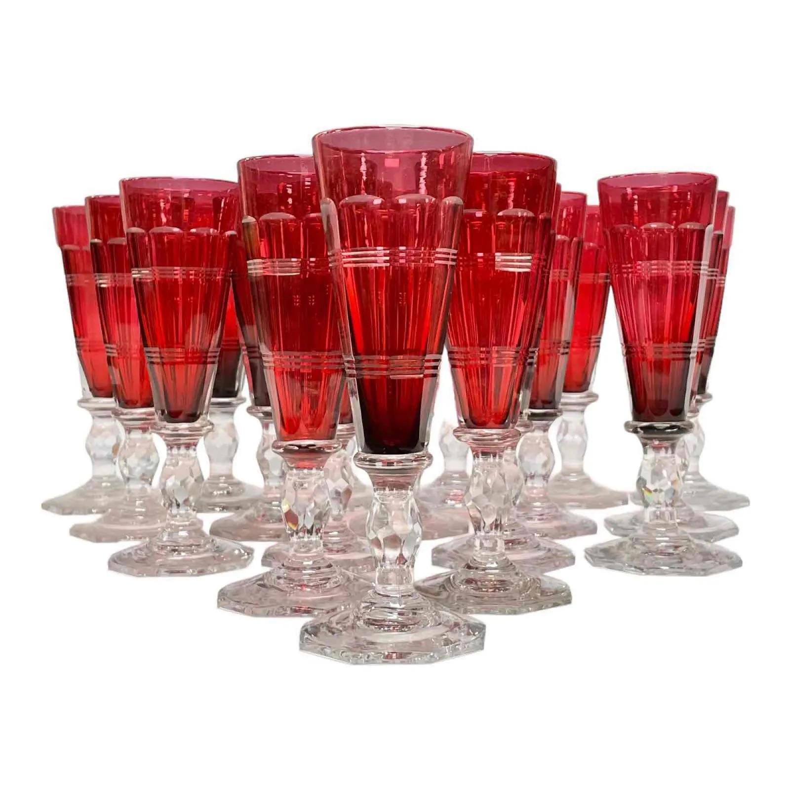 Early 20th Century Set of 18 Hand Blown Crystal Cranberry Champagne Flutes With Clear Stems & Base For Sale