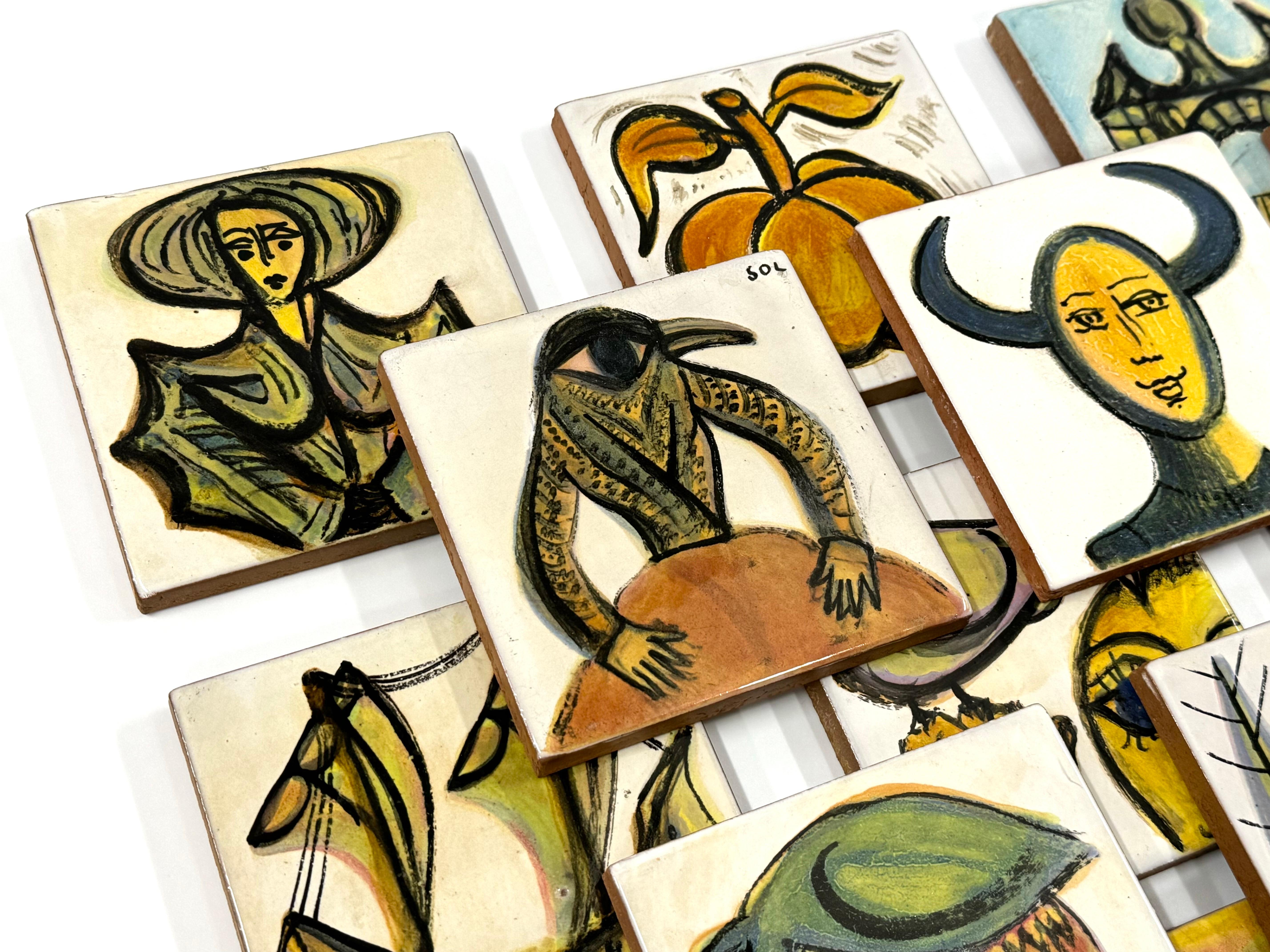 Set of eighteen original hand painted Greek art pottery tiles, circa 1970.

Tiles are abstract in style and feature surrealist figures, faces and mythological characters.  Tiles are constructed of red clay, each being hand painted and glazed.

The