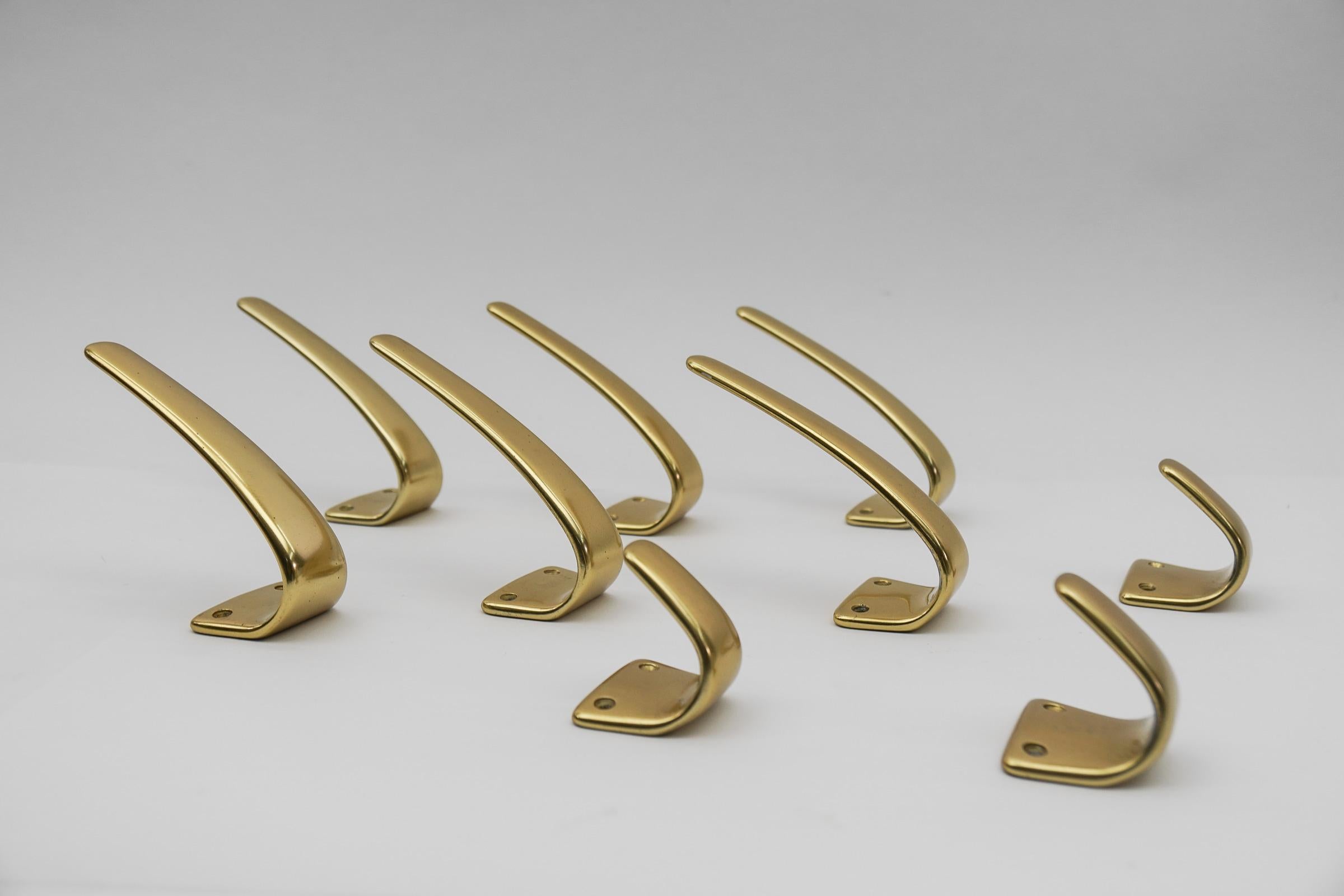 Mid-Century Modern Set of 18 Midcentury Brass Wall Hooks, Austria, 1950s For Sale