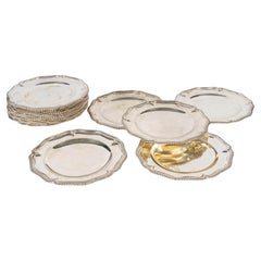 Set di 18 sottopiatti placcati in argento, circa 1900.